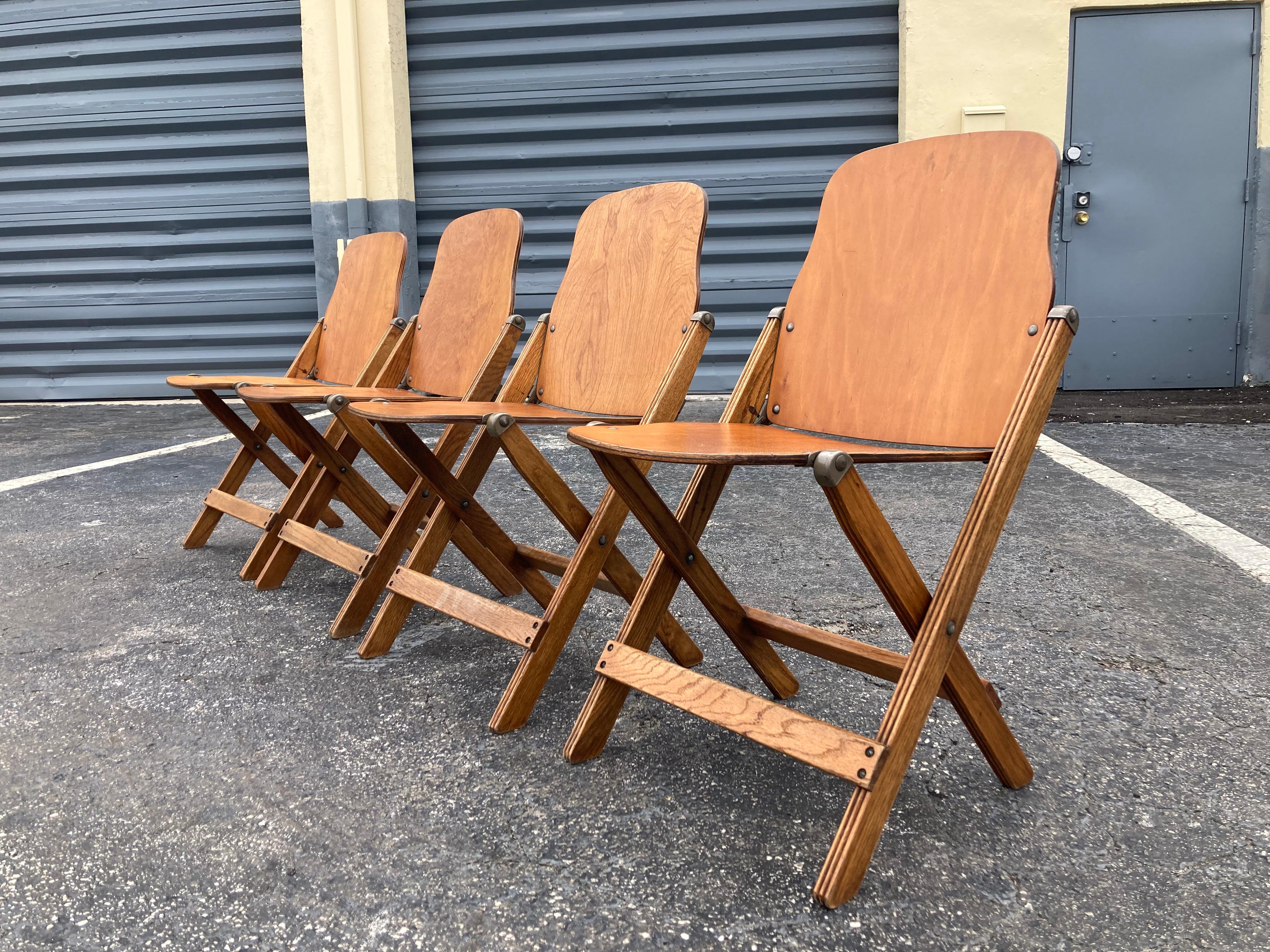 Great set of four vintage American folding chairs, great patina and look.