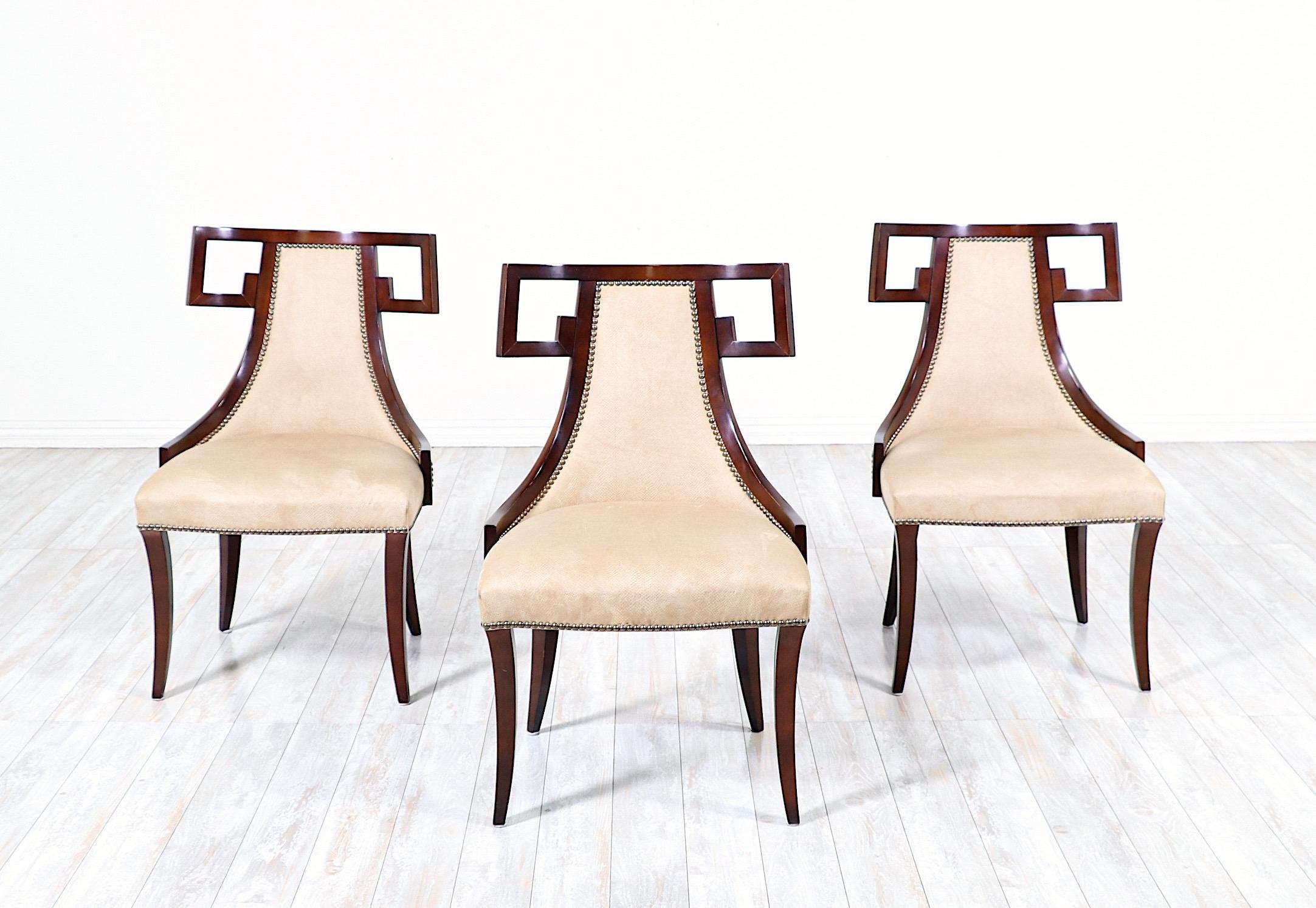 Fantastic, set of 4 “Greek” dining chairs designed by Thomas Pheasant for Baker Furniture. 

The “Greek” chair, model #7849, features clean, Classic lines inspired by the, timeless in design, Greek klismos chairs of antiquity. 

The chairs