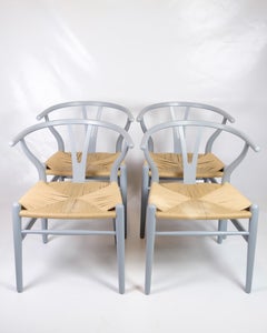 Set Of Four Grey Wishbone Chairs of Model CH24 designed by Hans J. Wegner