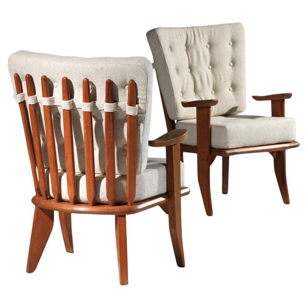 Set of four Guillerme and Chambron armchairs in solid oak from the 1960s For Sale