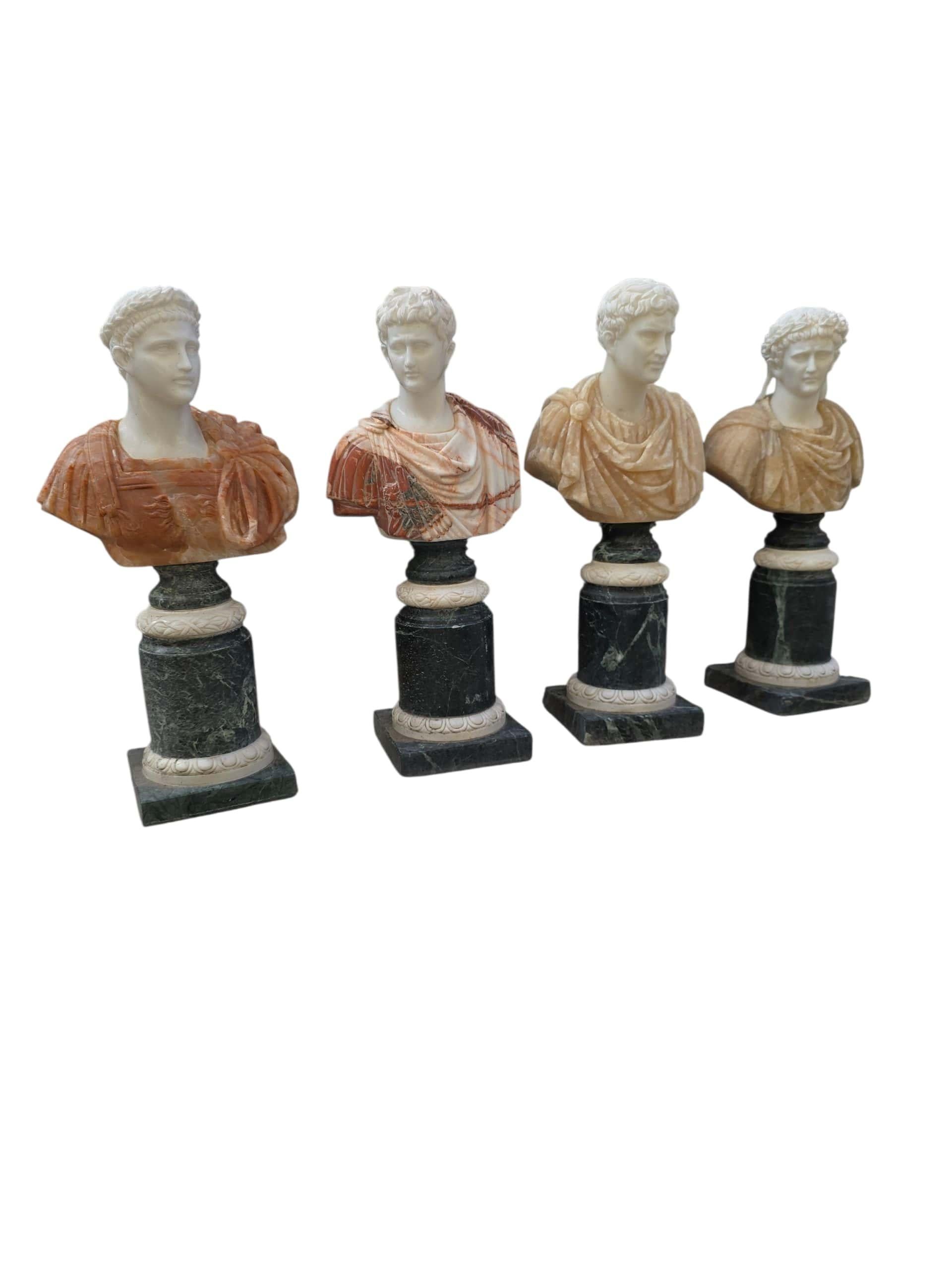 Elegant set of four marble busts representing Roman emperors, hand-carved in Italy from various colored marbles. Each sculpture showcases individual facial features, classical attire, and expressive detail, reflecting the grandeur and authority of