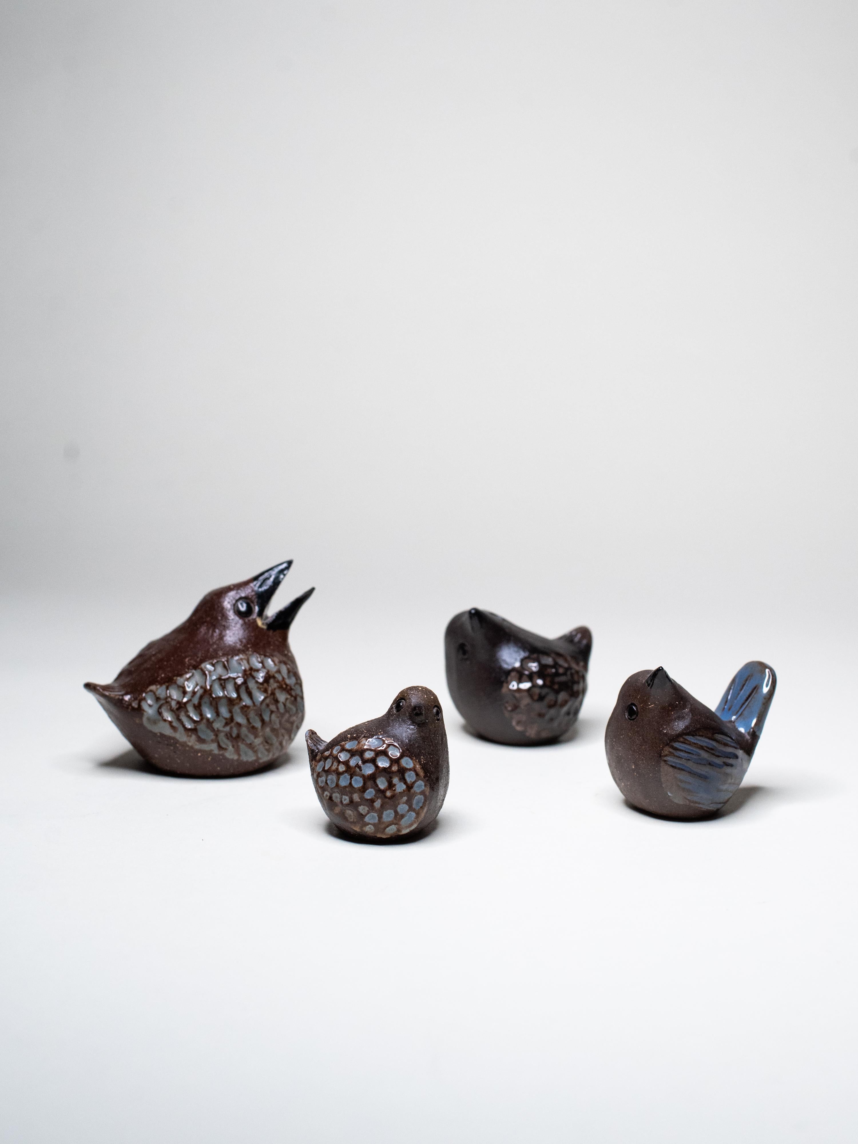 A set of four handmade stoneware birds by Swedish ceramicist Bengt Wall, crafted in his Trosa studio in the 1970s. Each unique and hand-signed, the figures combine Nordic folk charm with a modernist sense of form - simple, satisfyingly heavy, and