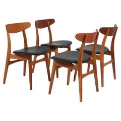 Set of Four Hans J. Wegner Dining Chairs Model CH-30 in Teak and Oak