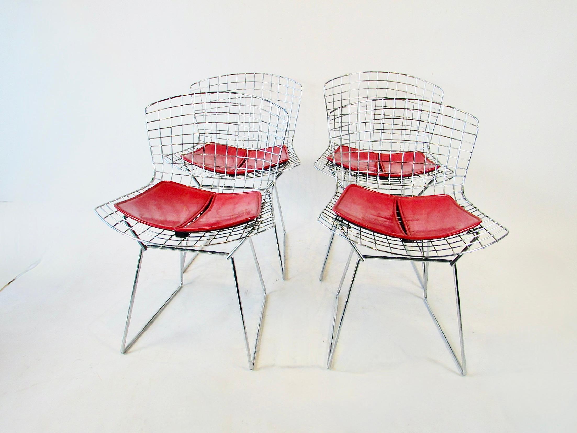 Mid-Century Modern Set of four Harry Bertoia for Knoll chrome dining chairs with deep red cushions