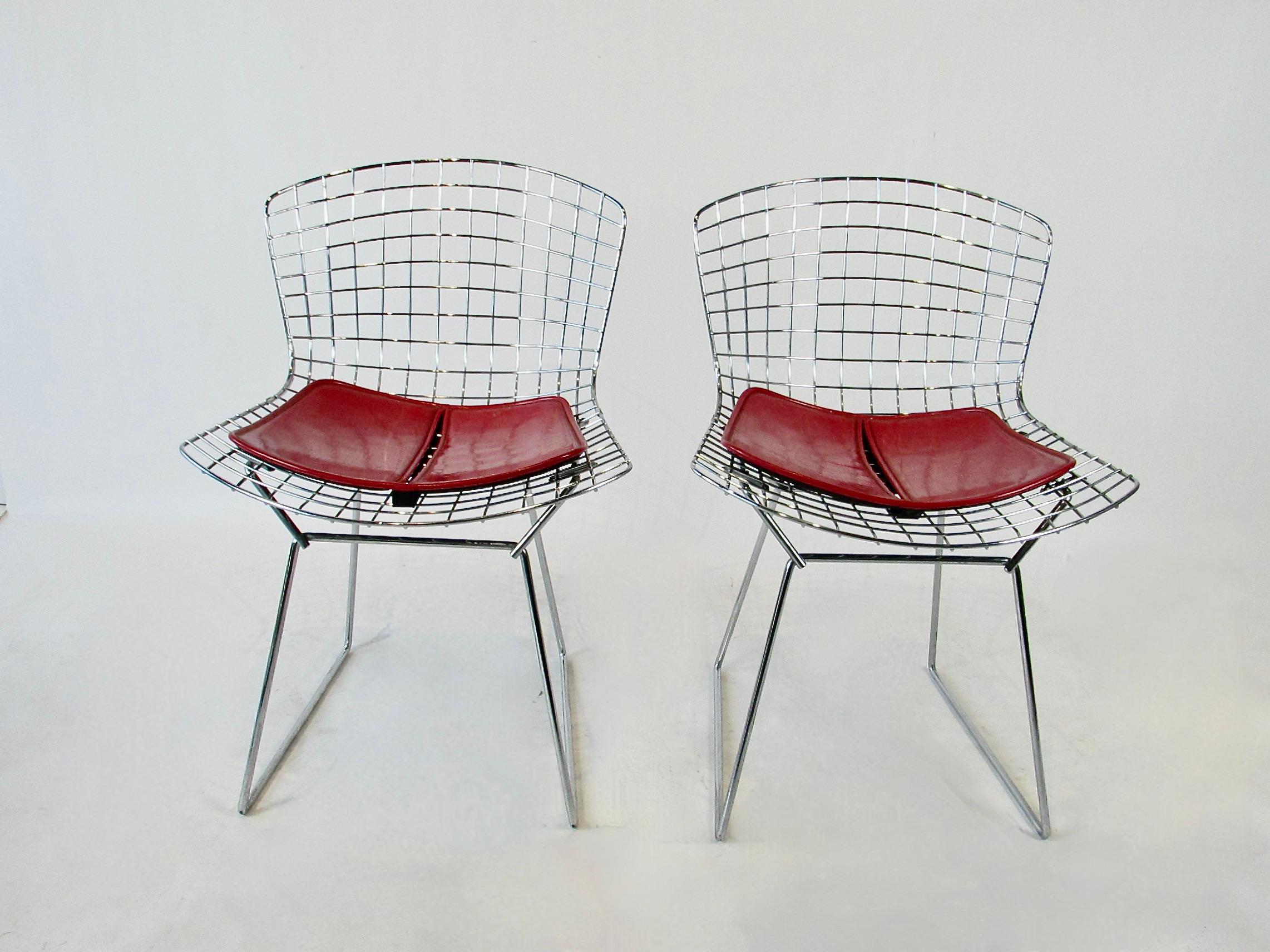 Welded Set of four Harry Bertoia for Knoll chrome dining chairs with deep red cushions