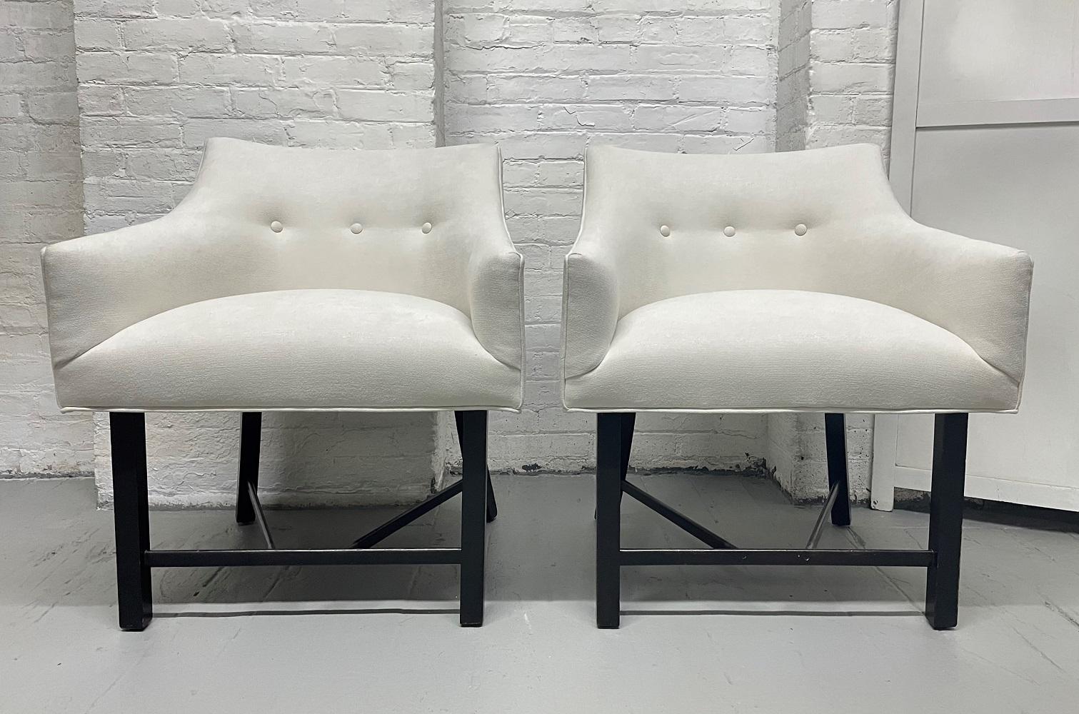 Set of four Harvey Probber lounge chairs. Chairs are newly upholstered with black lacquered frames.