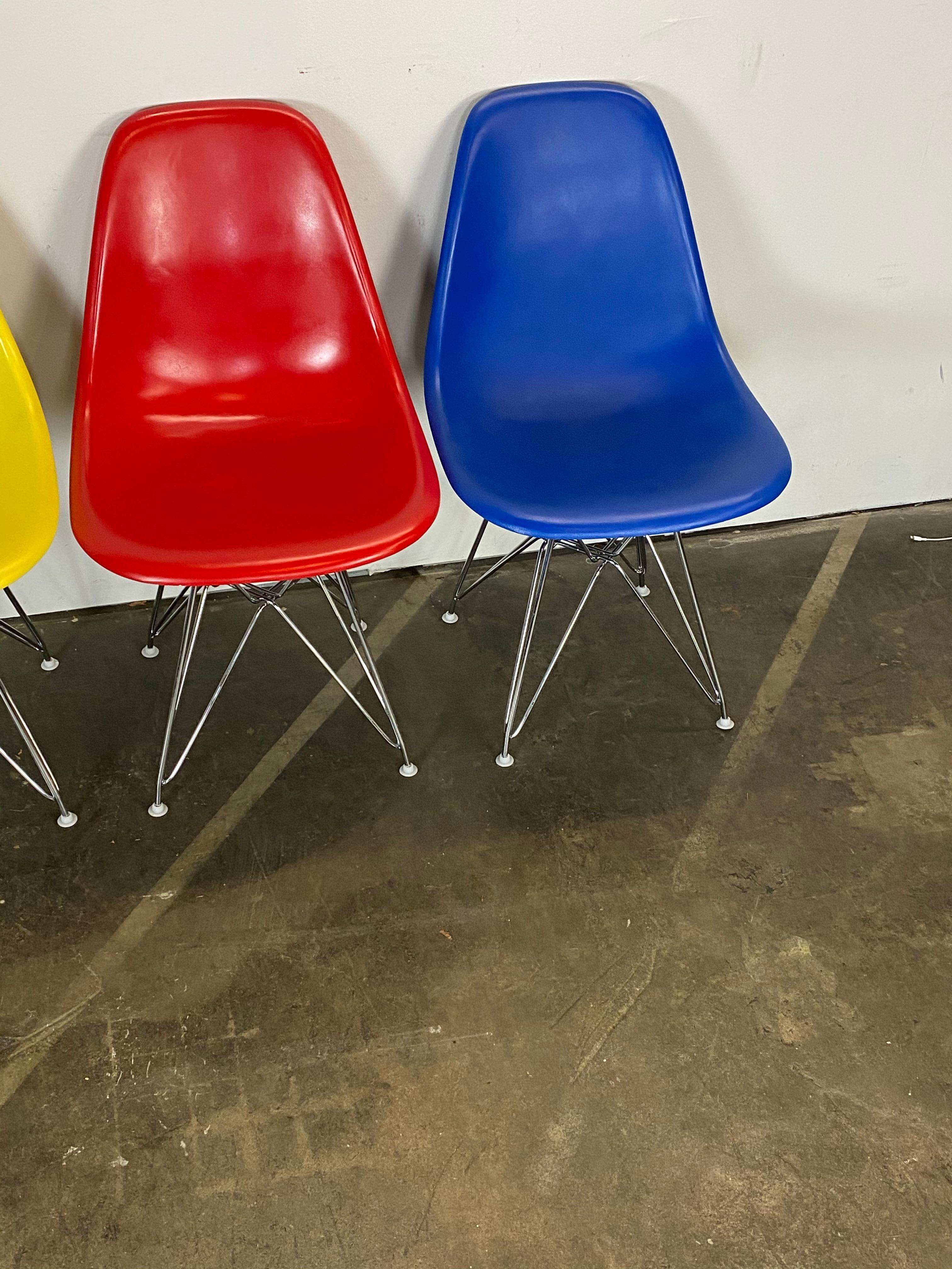 Fiberglass Set of Four Herman Miller Eames Dining Chairs For Sale