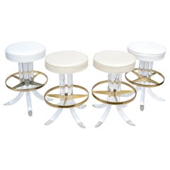 Set of Four Hill Manufacturing Swivel Lucite Bar Stool Brass Plated Footrest