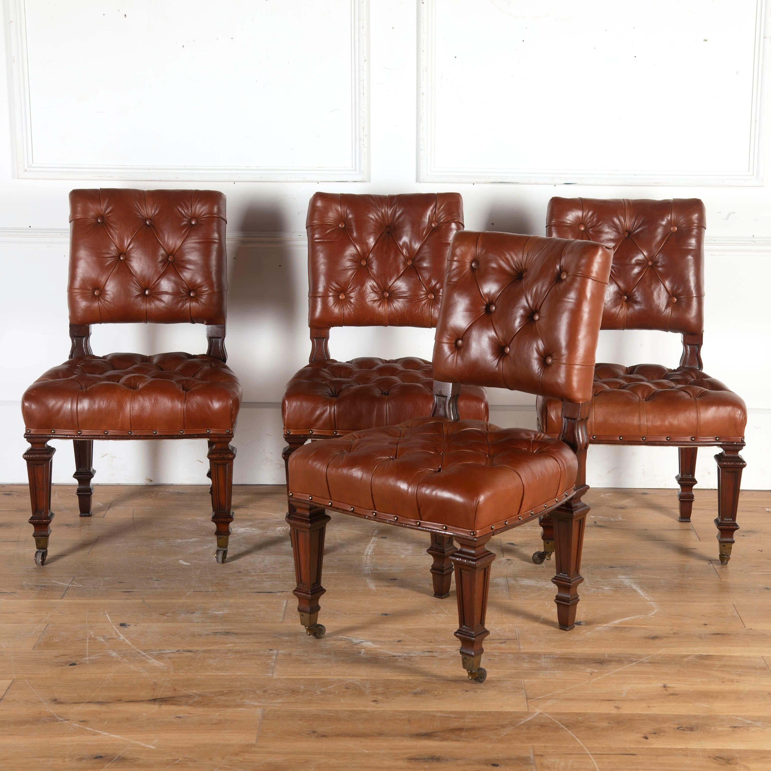 Fine quality set of four 19th century dining chairs by Holland & Sons.

These wonderful chairs feature square buttoned backs and generous seats, which have been reupholstered in an aged soft nut brown leather. 

They are supported on polished