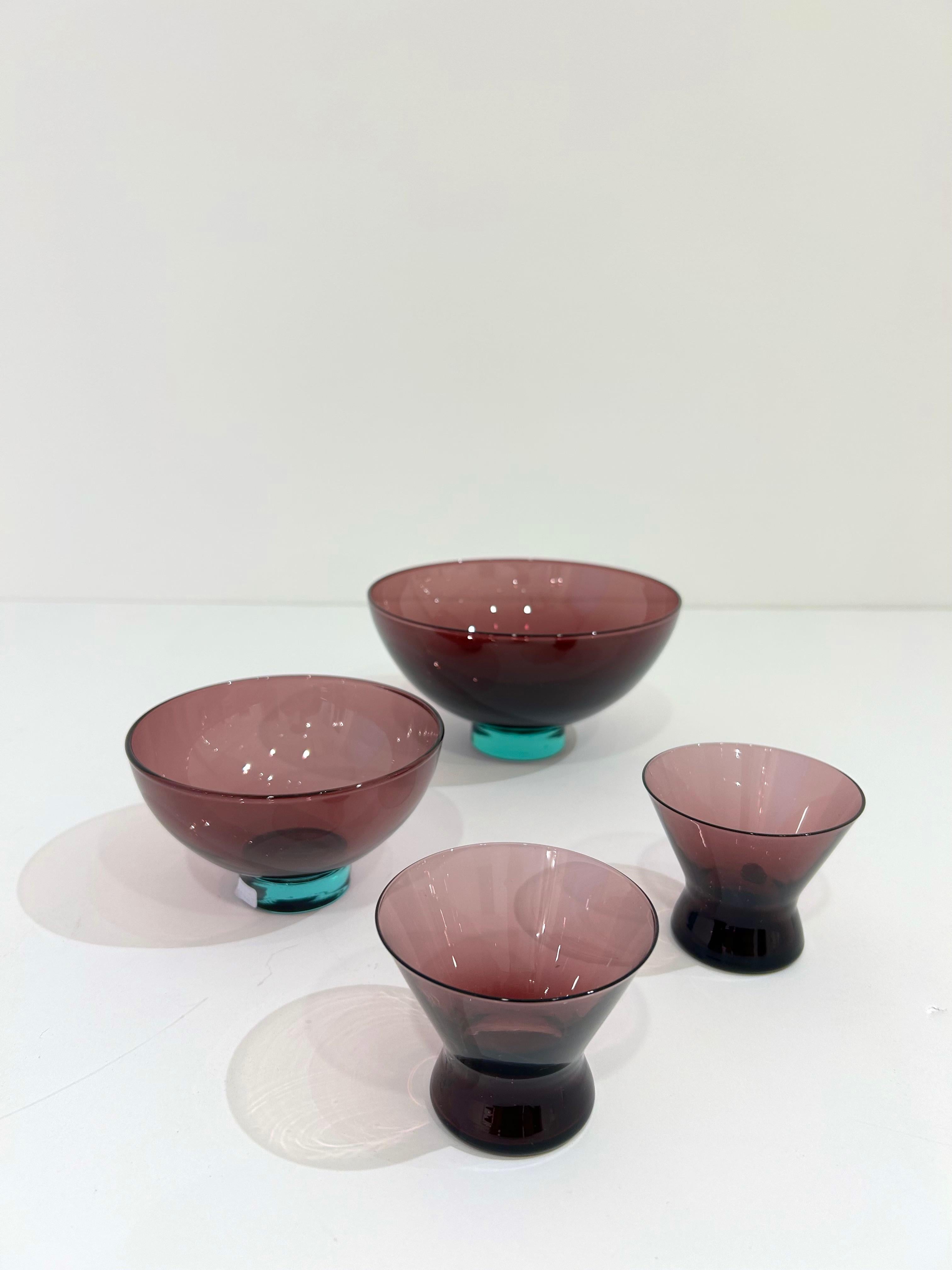 Set of four Holmegaard glass dishes by Pet Lutken. Two bowls and two serving cups.
Lütken designed more than 3,000 pieces of glass for Holmegaard, for whom he worked from 1942 and until his death in 1998.