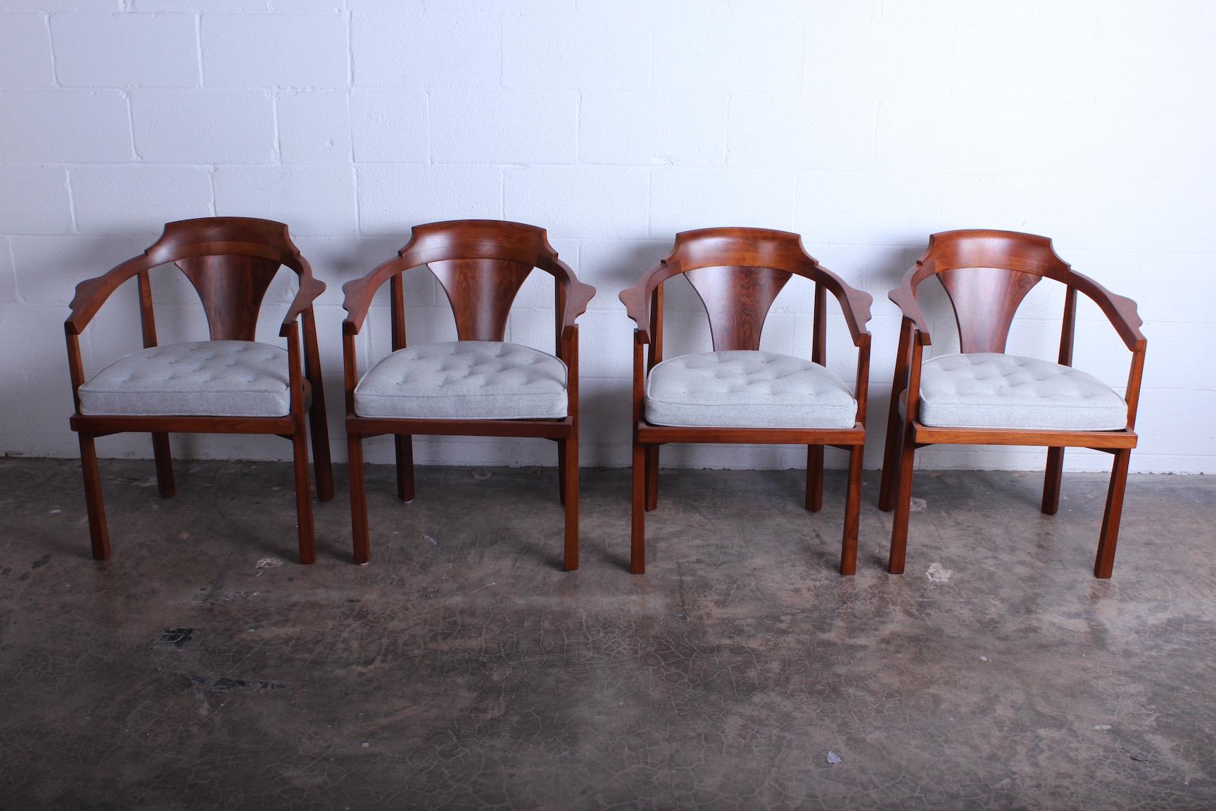 A set of four horseshoe armchairs designed by Edward Wormley for Dunbar.