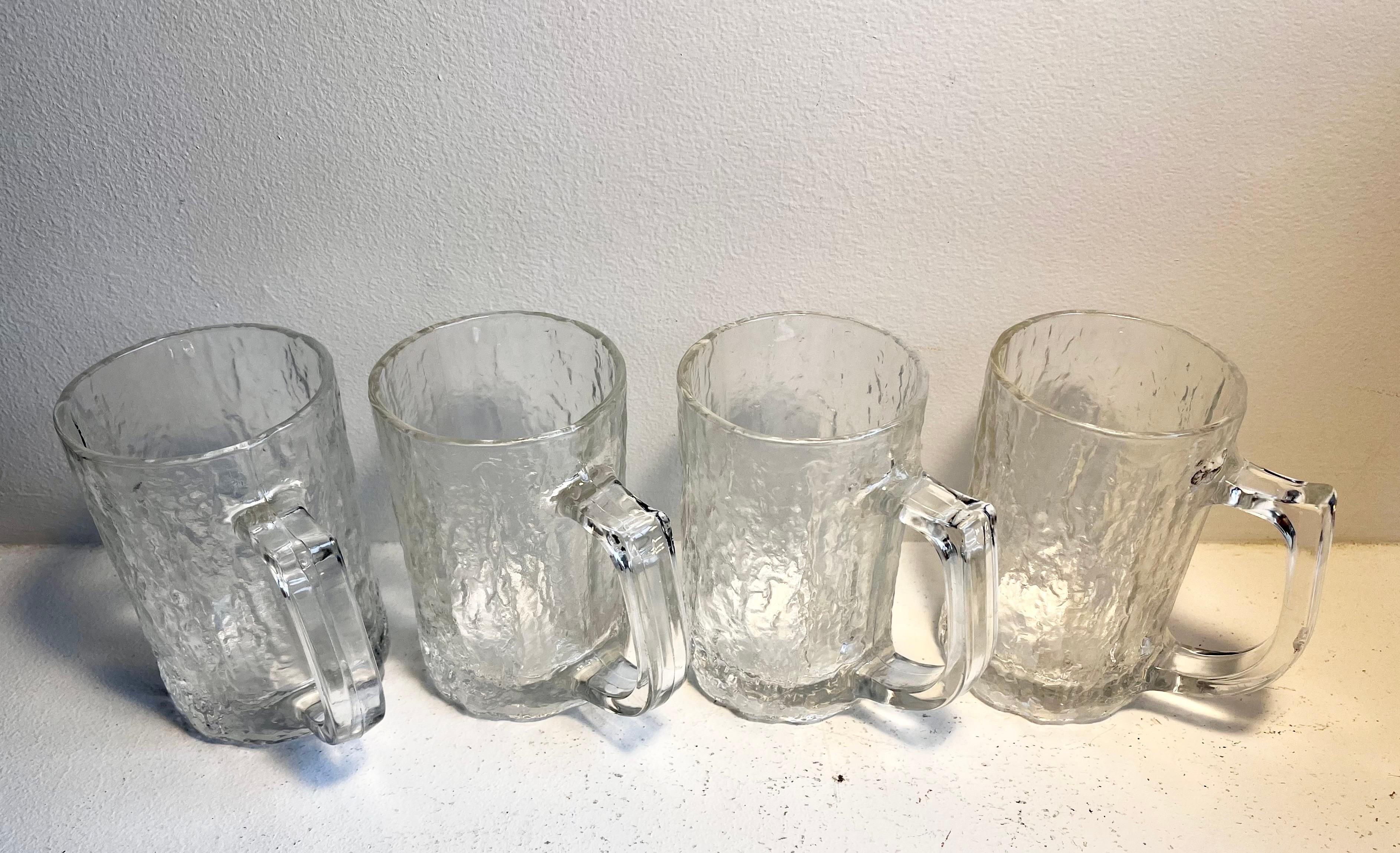 Juego de cuatro jarras de cerveza 