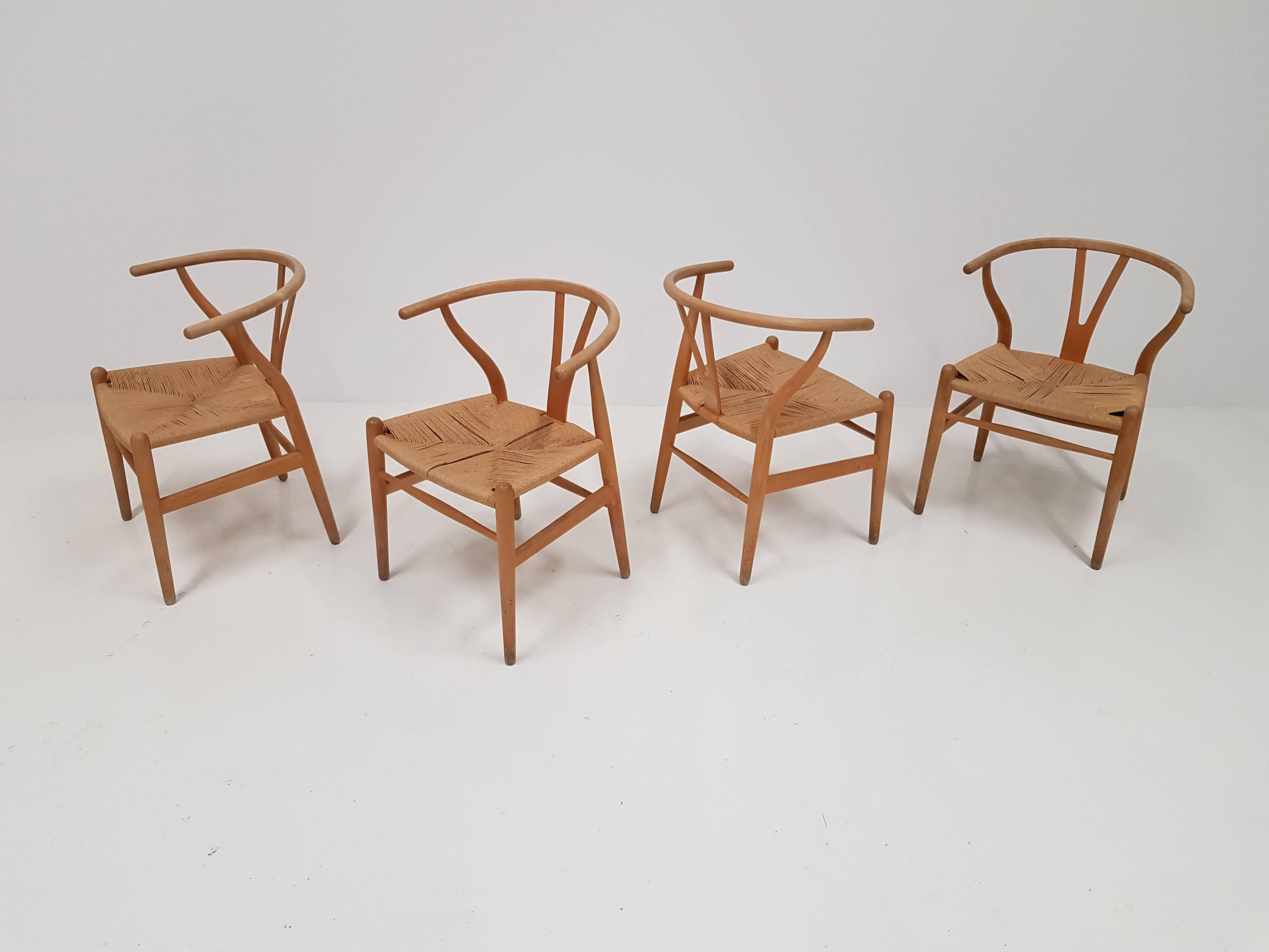 Scandinavian Modern Set of Four Iconic Vintage Danish Hans J. Wegner CH24 'Wishbone' Chairs