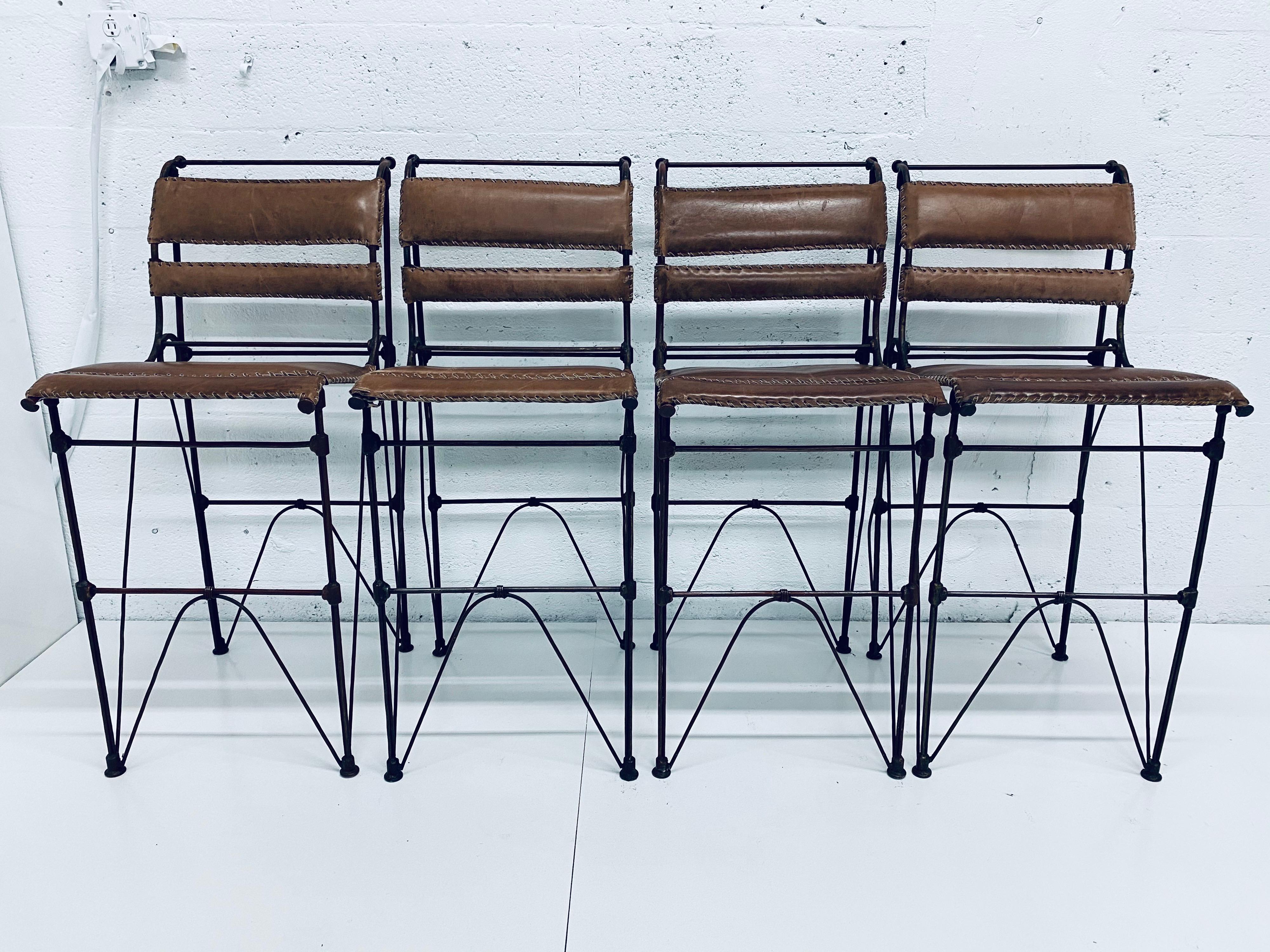 Set of four Ilana Goor attributed brown leather and iron rebar barstools / bar chairs, circa 1970s. See condition information.