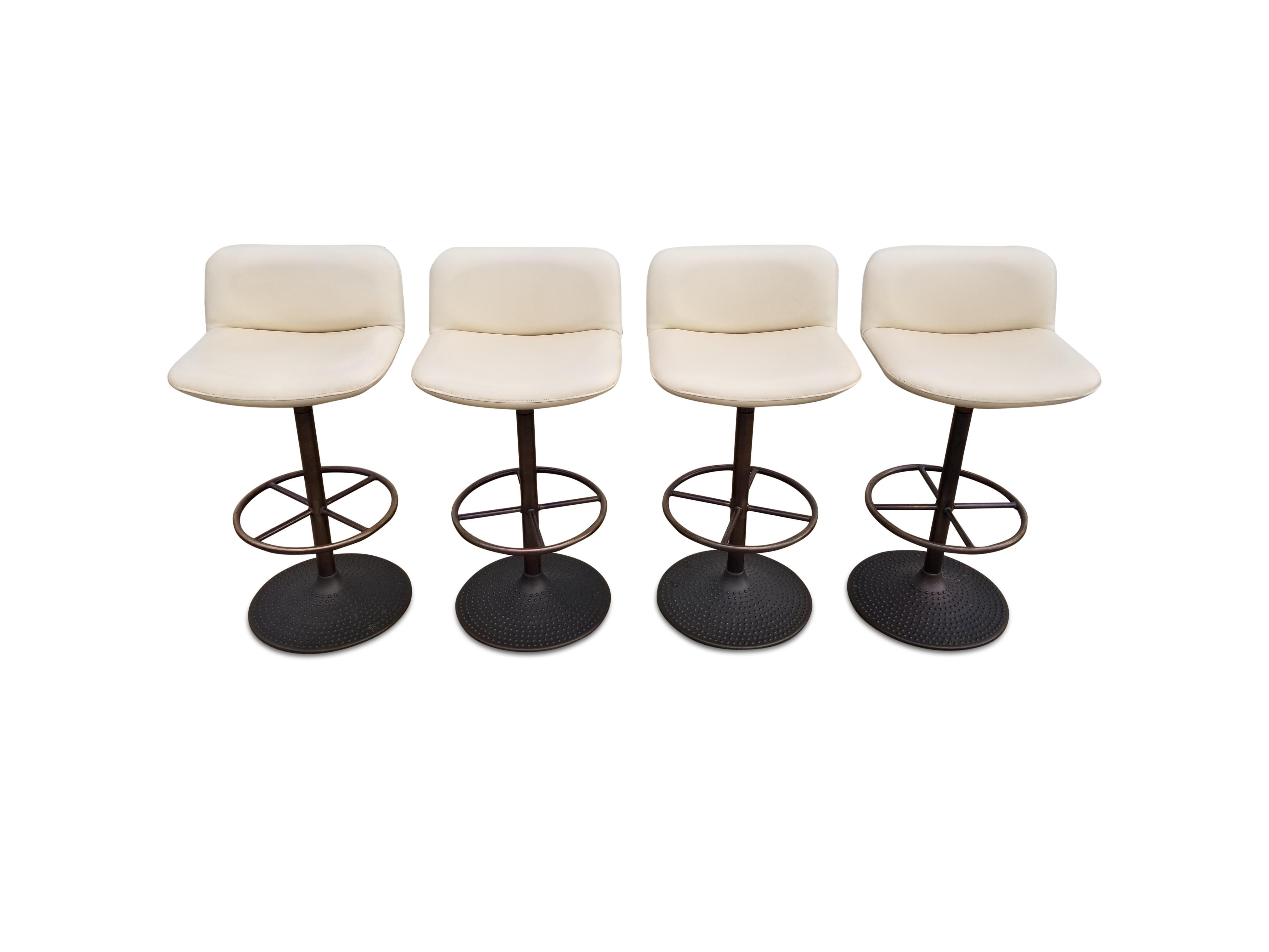 Set of four Ilmari Tapiovaara Caribe  swivel stools.