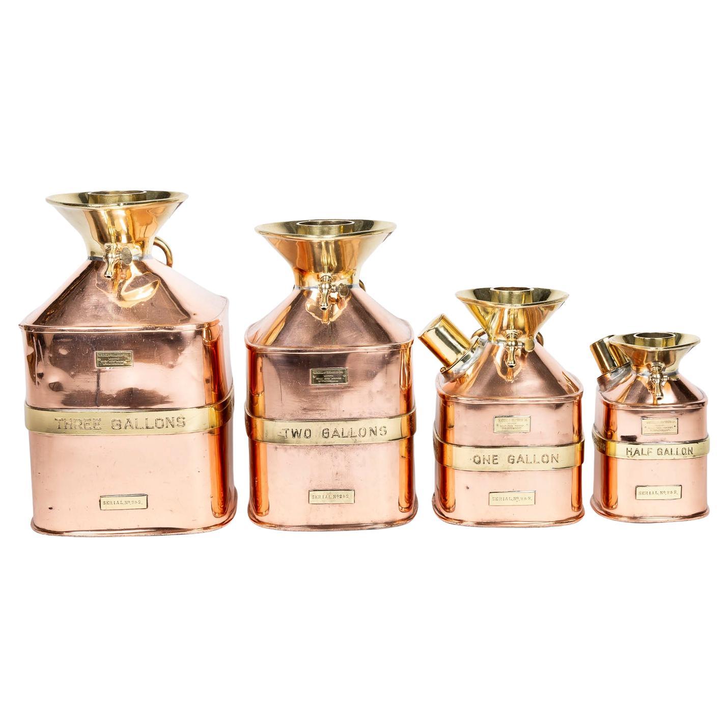 Set of four imperial fuel standard measures by Gaskell & Chambers in case