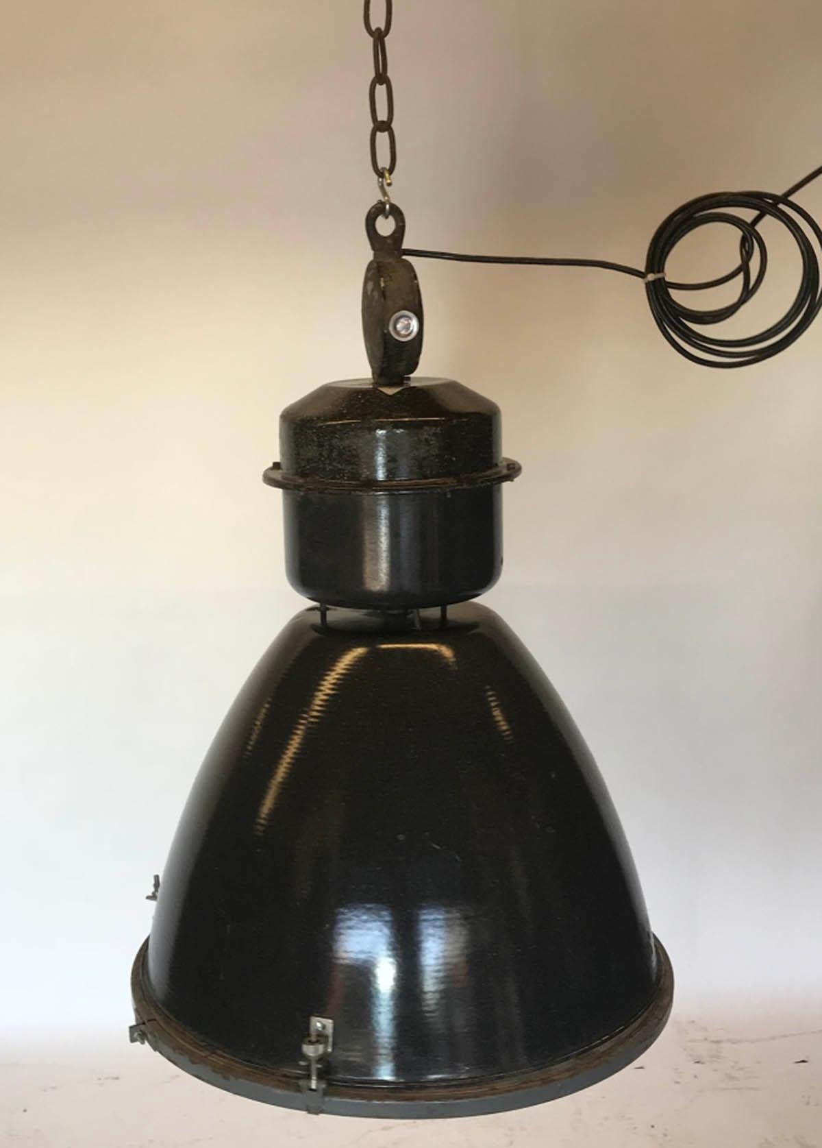 Very similar Industrial factory pendant lights, in black/grey enameled steel. Wired and ready to be hung. All sold separately. ONLY TWO AVAILABLE