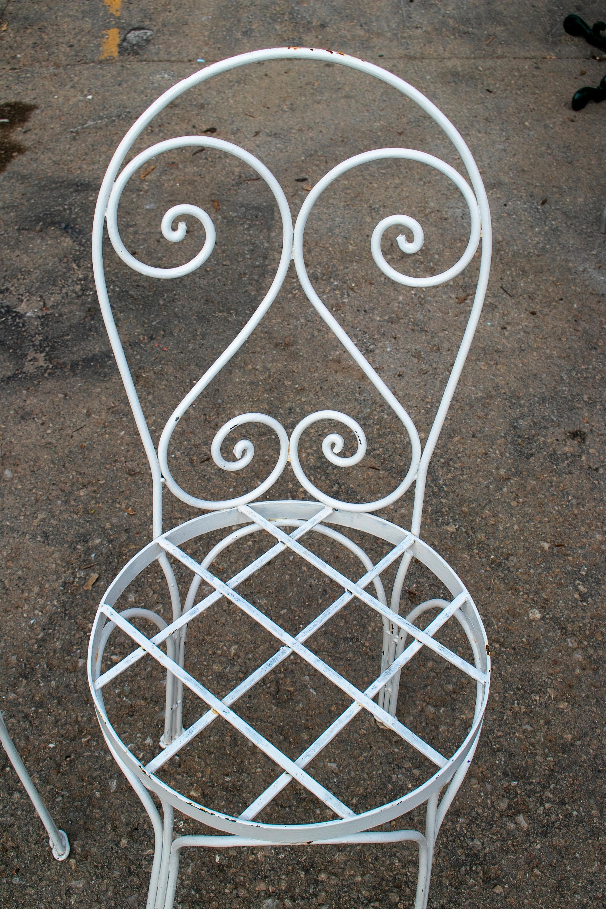 Late 20th Century Set of Four Iron Garden Chairs