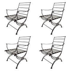 Set of Four Iron Lounge Chairs Attributed to Woodard