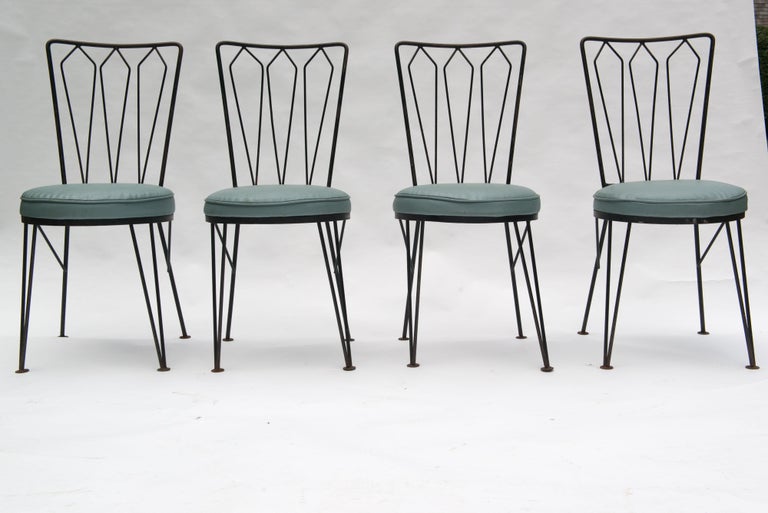 Mid-Century Modern Set of Four Iron Mid-Century Dining Chairs by Woodard For Sale