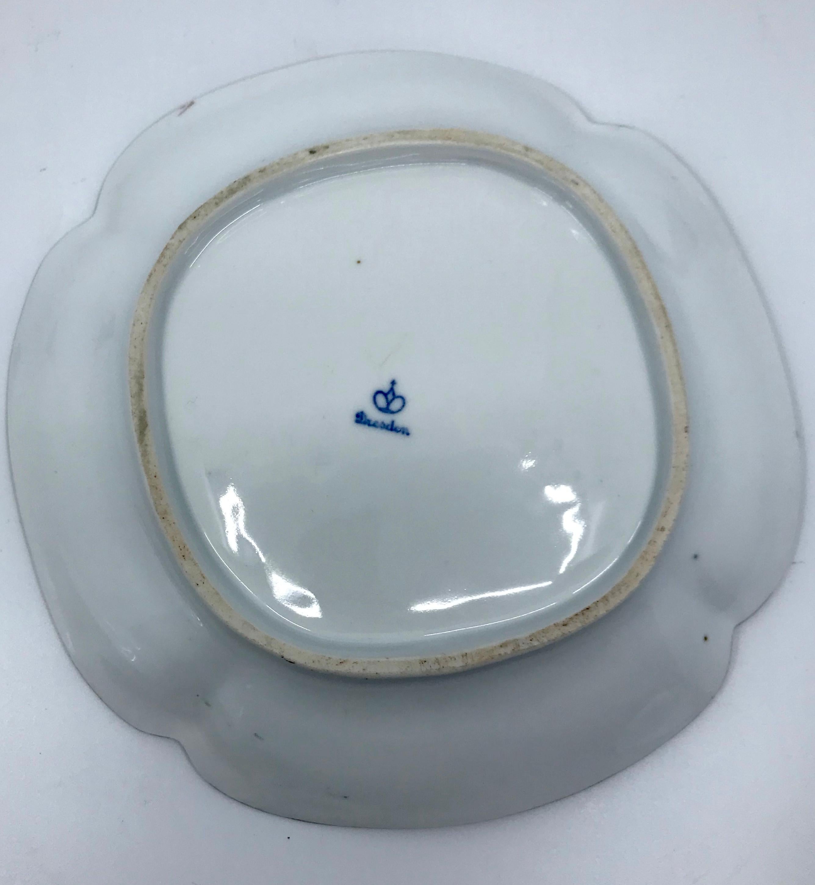 Set of Four Orange and Gilt Painted Plates 1