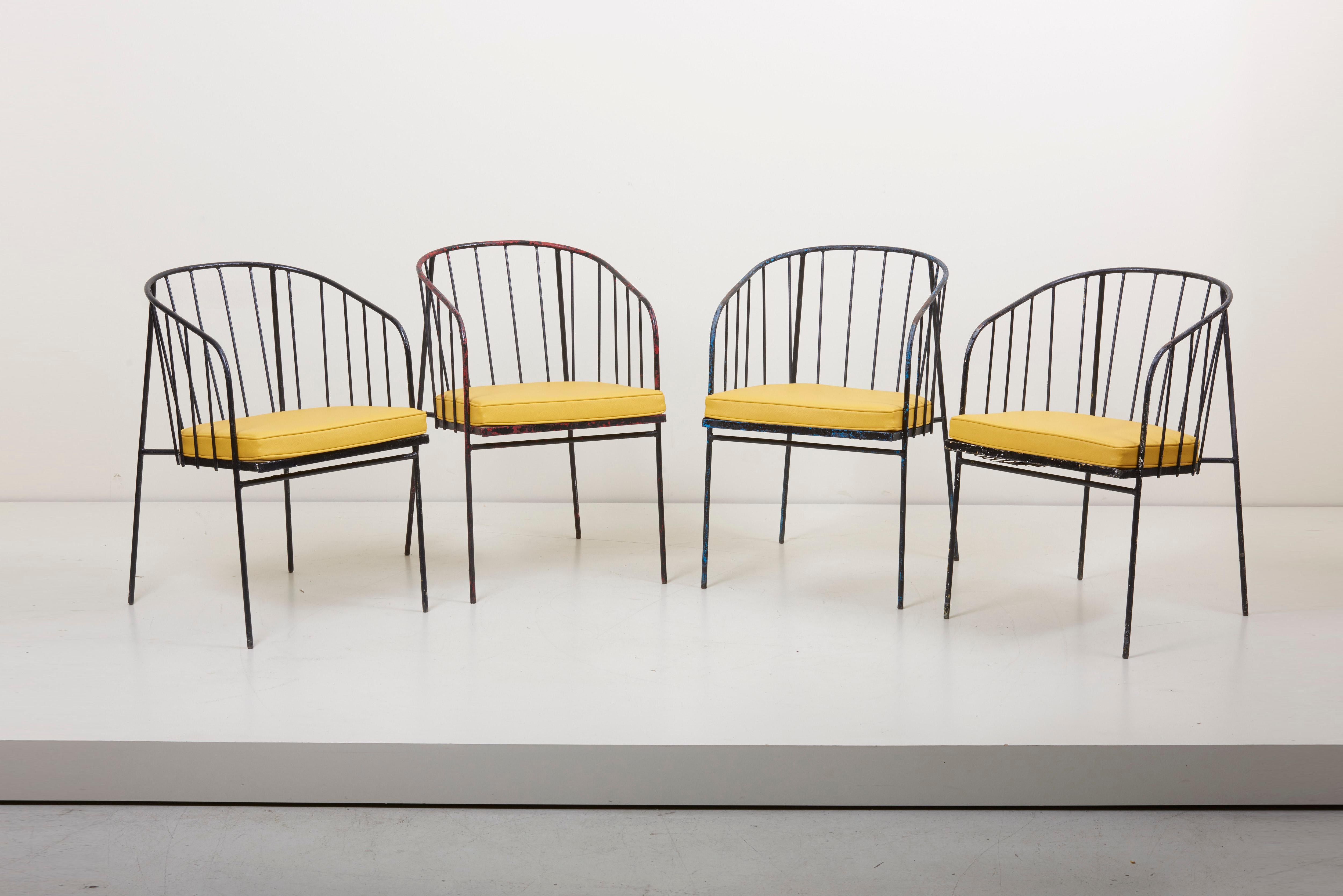 Rarely seen set of four George Nelson & Associate designed armchairs for Arbuck Inc. produced only in 1951-1952. Original condition. Just the yellow cushions are new made in imitation leather.