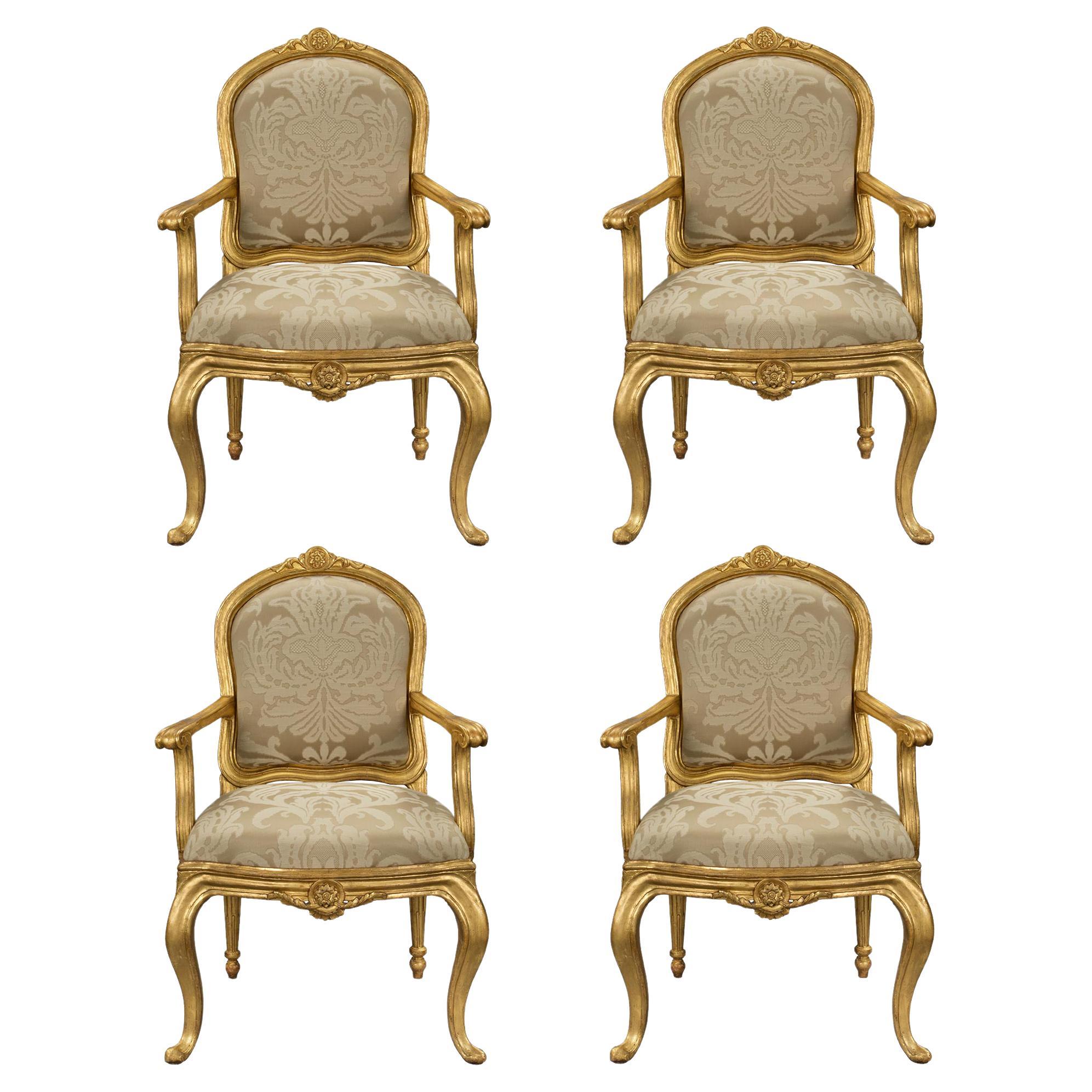 Set of Four Italian 18th Century Transitional Period Giltwood Armchairs For Sale