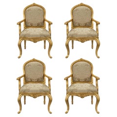 Set of Four Italian 18th Century Transitional Period Giltwood Armchairs