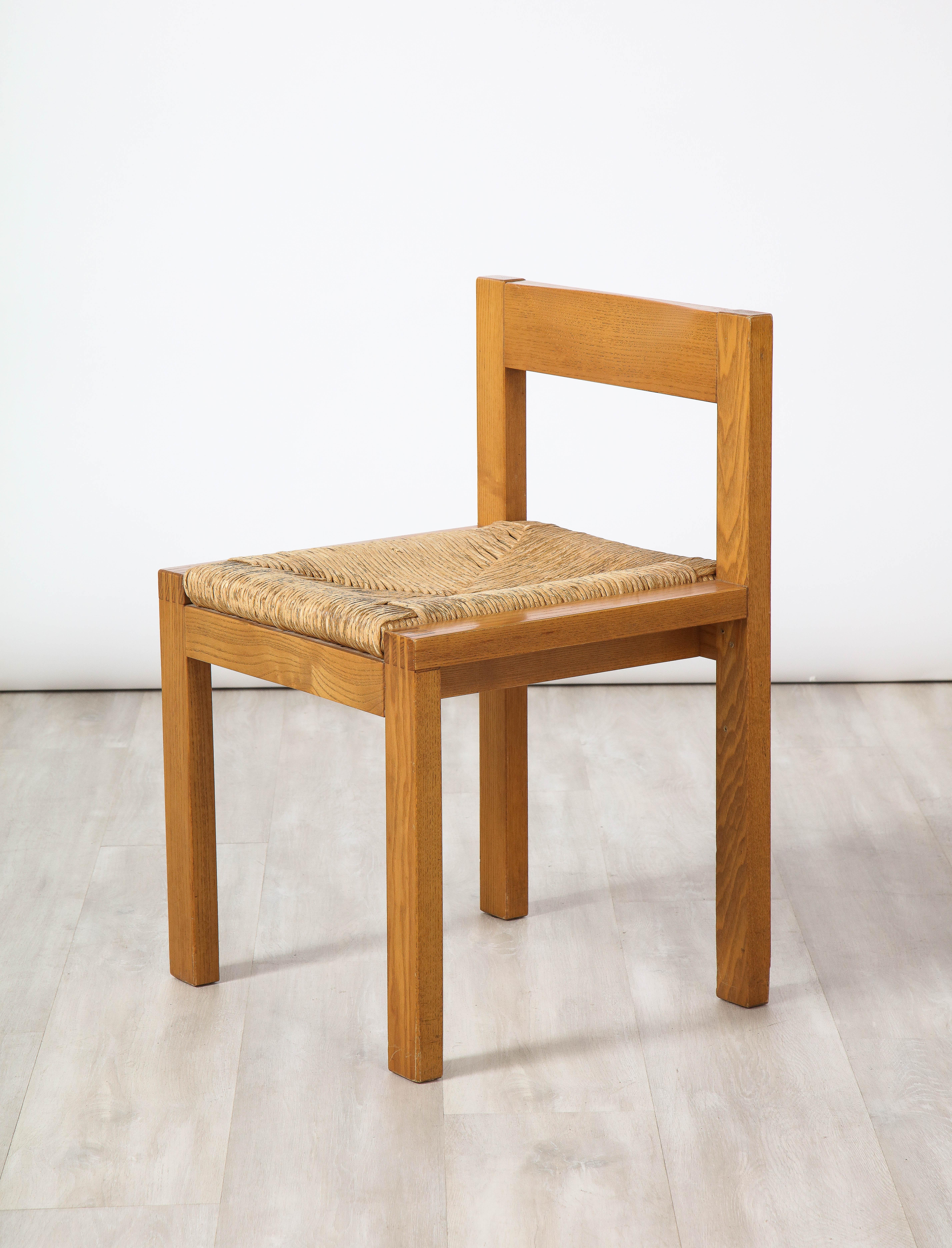 Mid-20th Century Set of Four Italian 1950's Oak and Rush Seat Dining Chairs For Sale