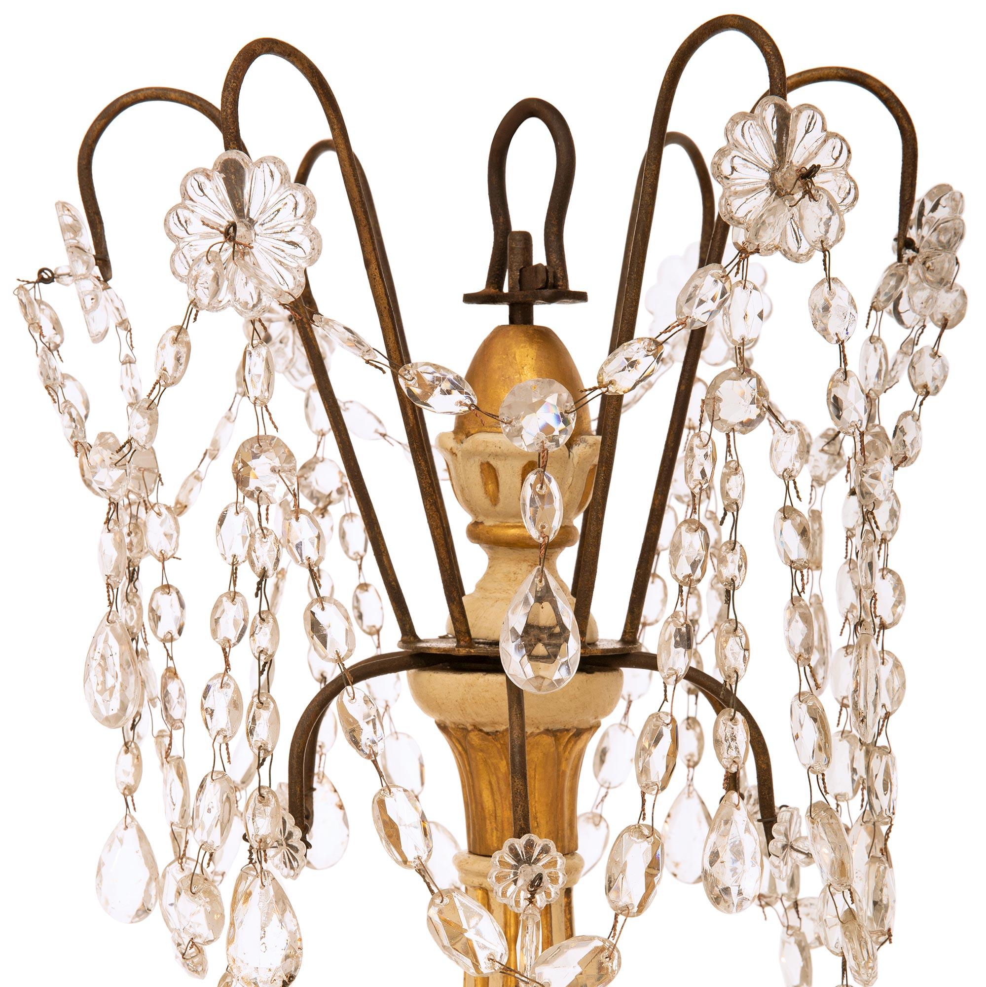 19th Century Set of four Italian 19th century Crystal, Giltwood, and Wrought Iron chandeliers For Sale