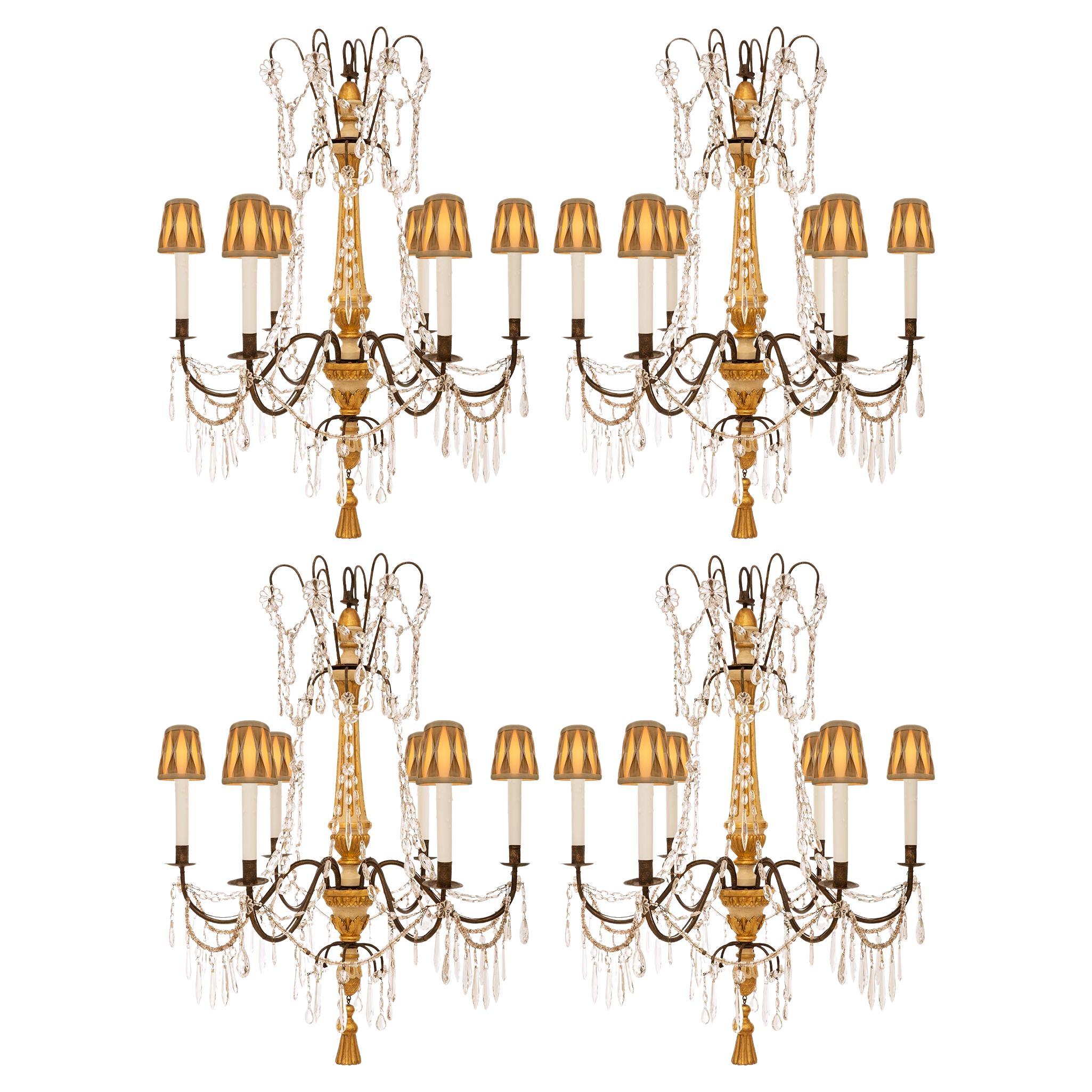 Set of four Italian 19th century Crystal, Giltwood, and Wrought Iron chandeliers For Sale
