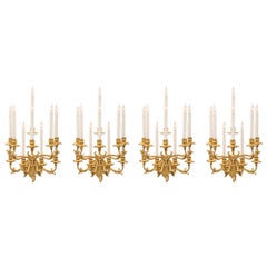 Set of Four Italian 19th Century Roccoco Giltwood and Gilt Metal Sconces