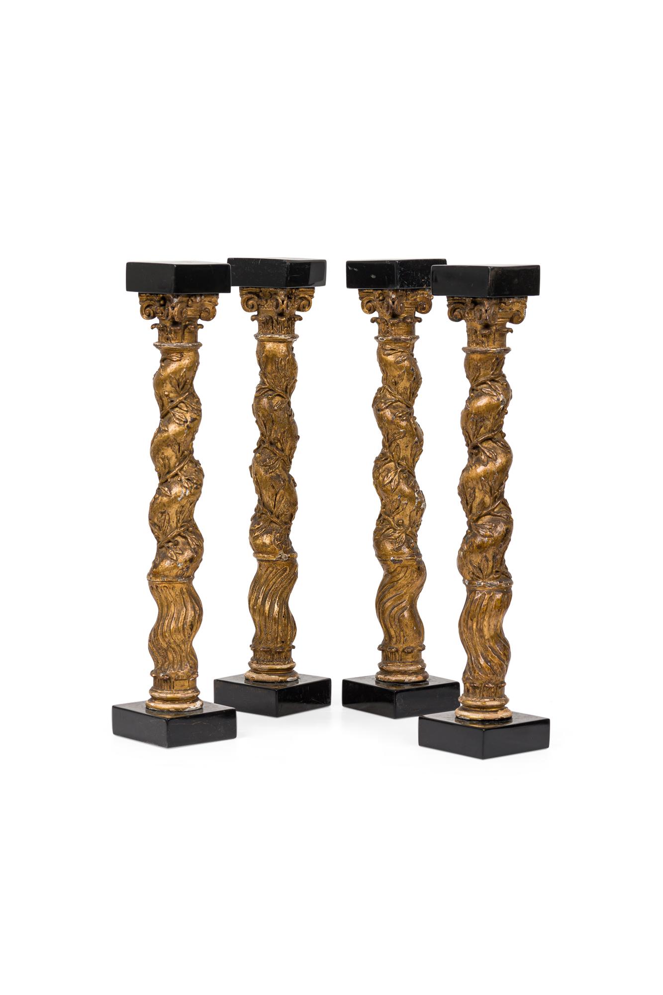 SET of Four miniature models of gilt Italian Baroque Solomonic Columns with swirl design having a black base and tops (Mid-18th Century) (PRICED AS SET)