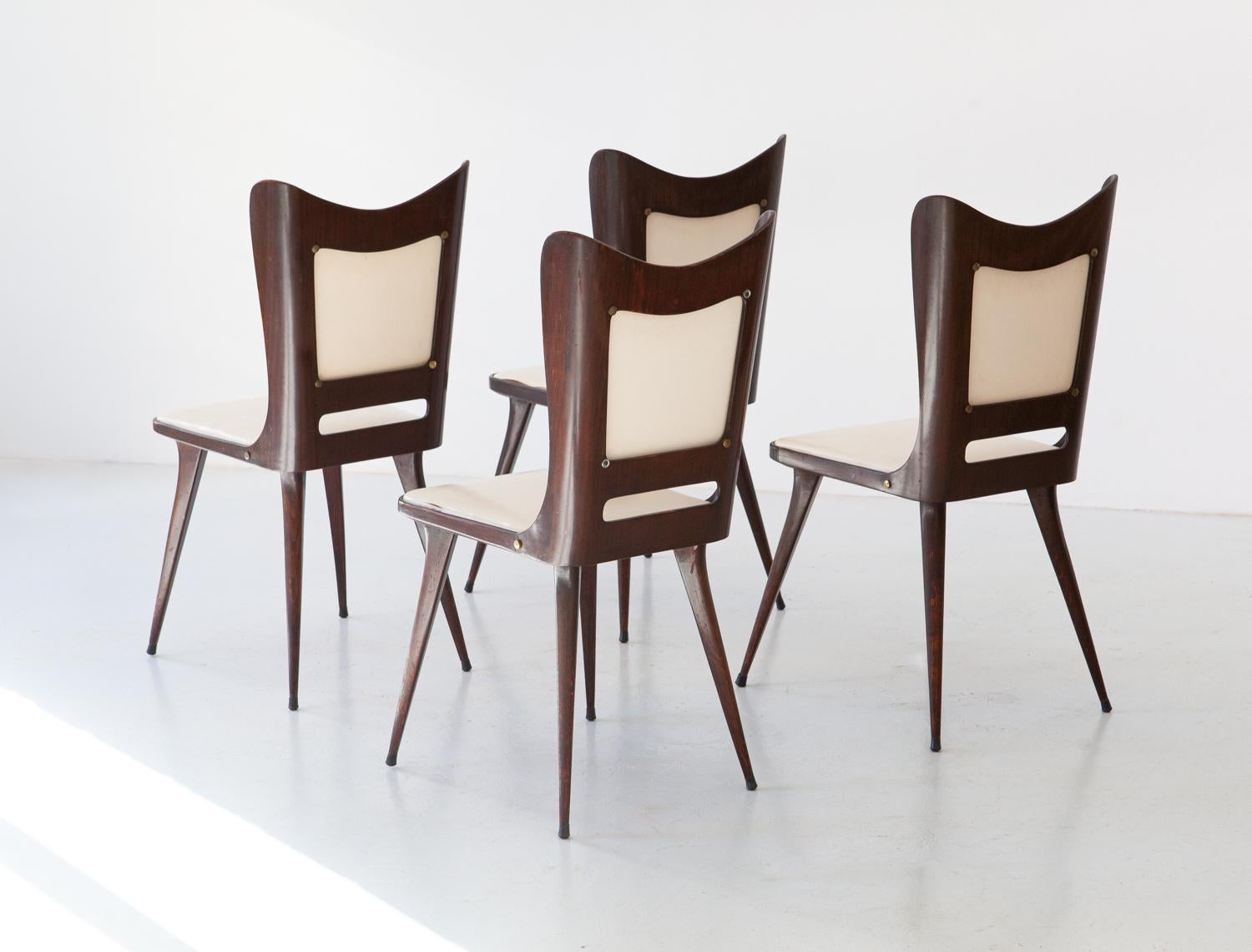 Mid-20th Century Set of Four Italian Beige Skai and Wood Dining Chairs, 1950s For Sale
