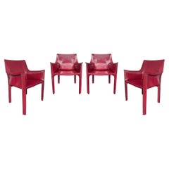 Set of Four Italian Cab Armchairs or Dining Chairs by Mario Bellini Red Leather
