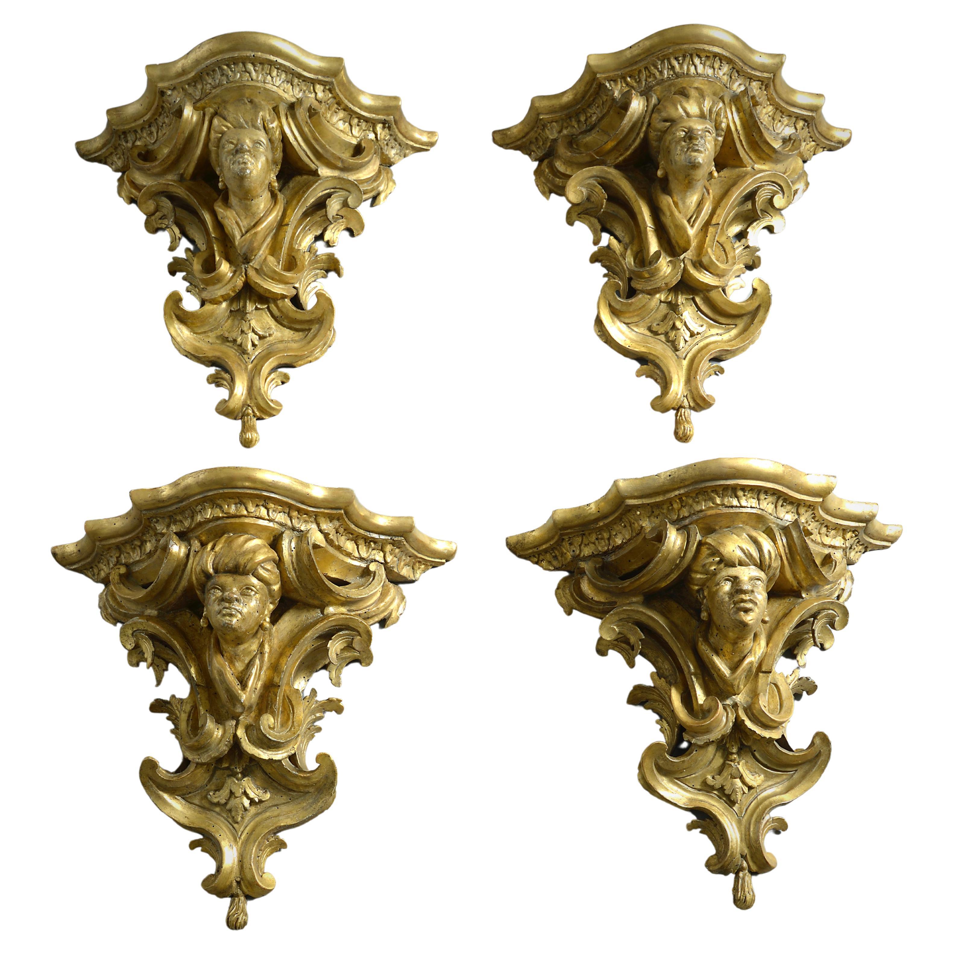 Set of Four Italian Carved Giltwood Brackets For Sale