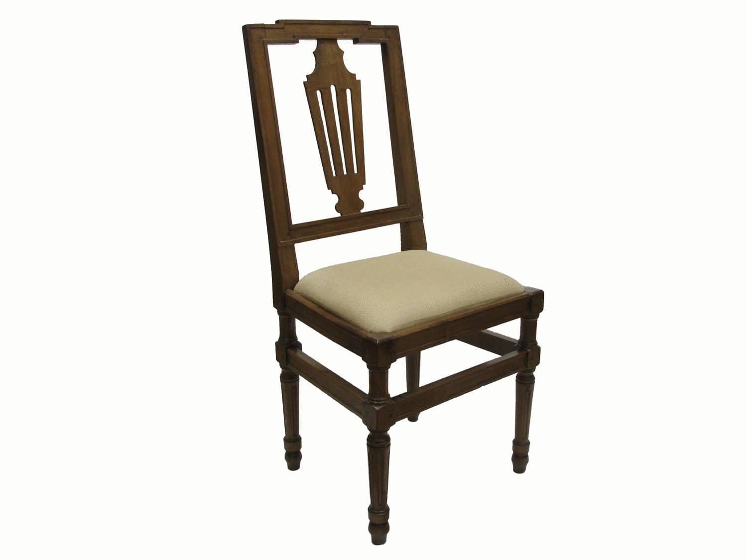 Four late 19th century Italian walnut chairs, a group of four Piedmontese chairs, solid blond walnut structure, in good condition, high back decorated with stylized patterns. turned and fluted legs, beige color upholstery. 
Warm wax polish