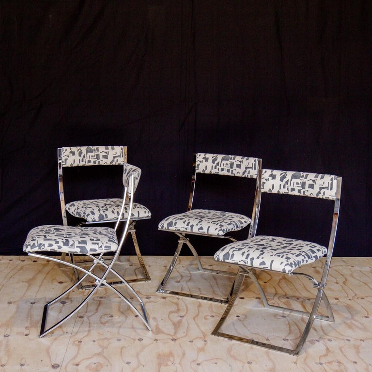 A set of four Italian foldable chrome chairs titled 'Luisa' designed by Marcello Cuneo for Mobel Italia and upholstered in a Thomas Callaway designed printed linen, 1970s.

 