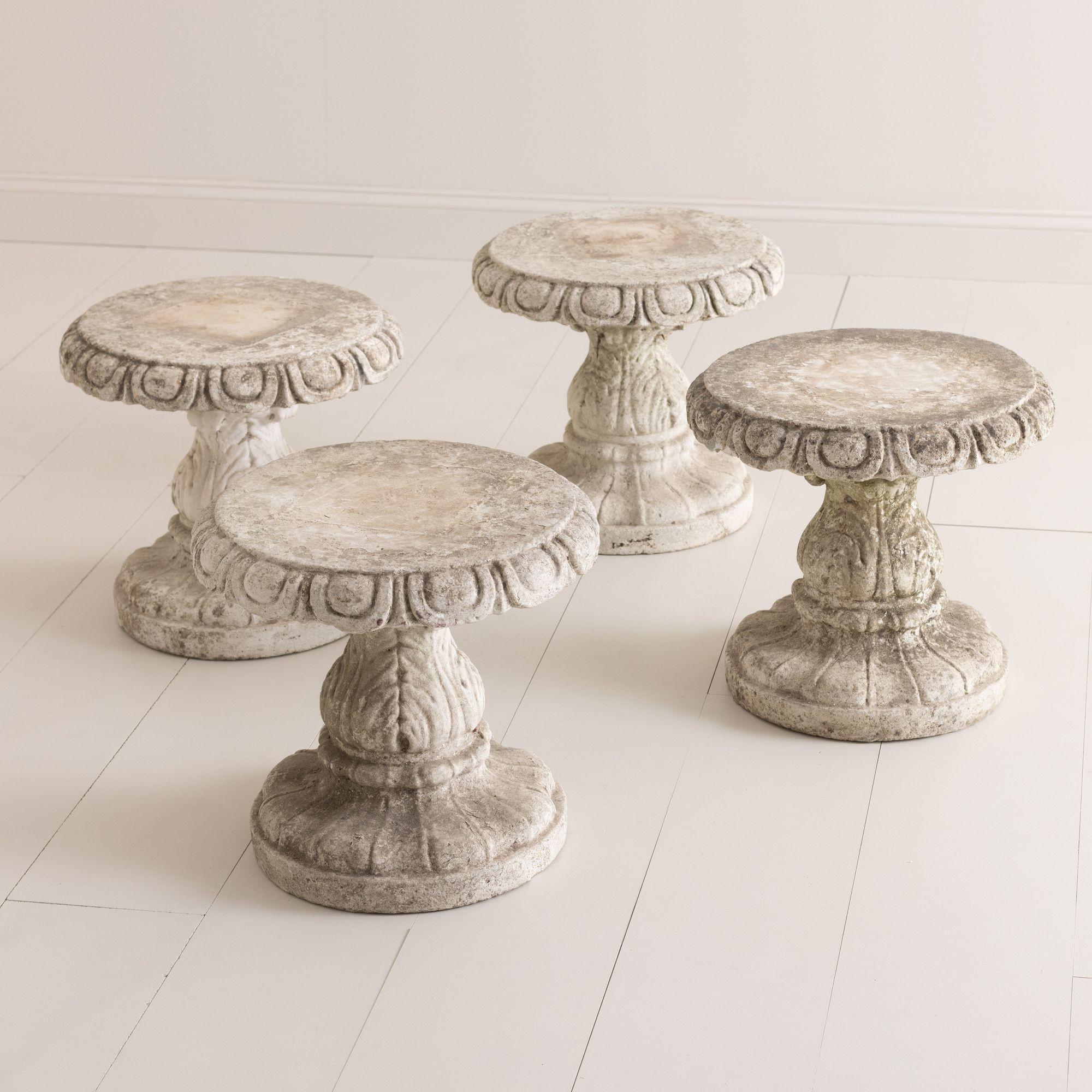 A set of four concrete garden stools from Italy in the Neoclassical style, c. 1920. Beautiful round stools with carved detail. 


We offer expedited, fully-insured, custom packaged / crated, global shipping, including delivery to the door