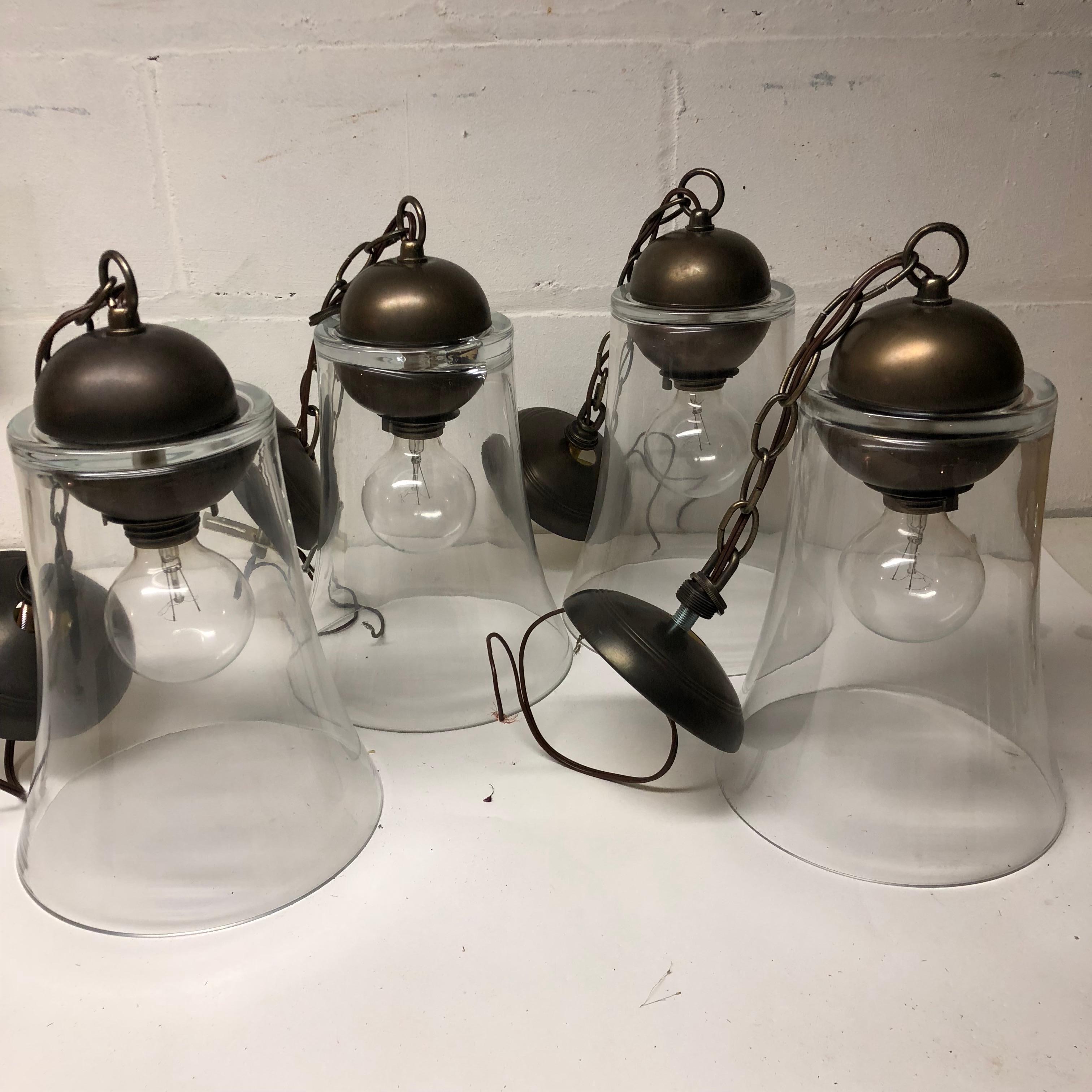 Set of four Italian glass pendant light fixtures. One of them has a tiny chip to its edge, another one is slightly cracked both photographed. 

Overall height as shown is 23