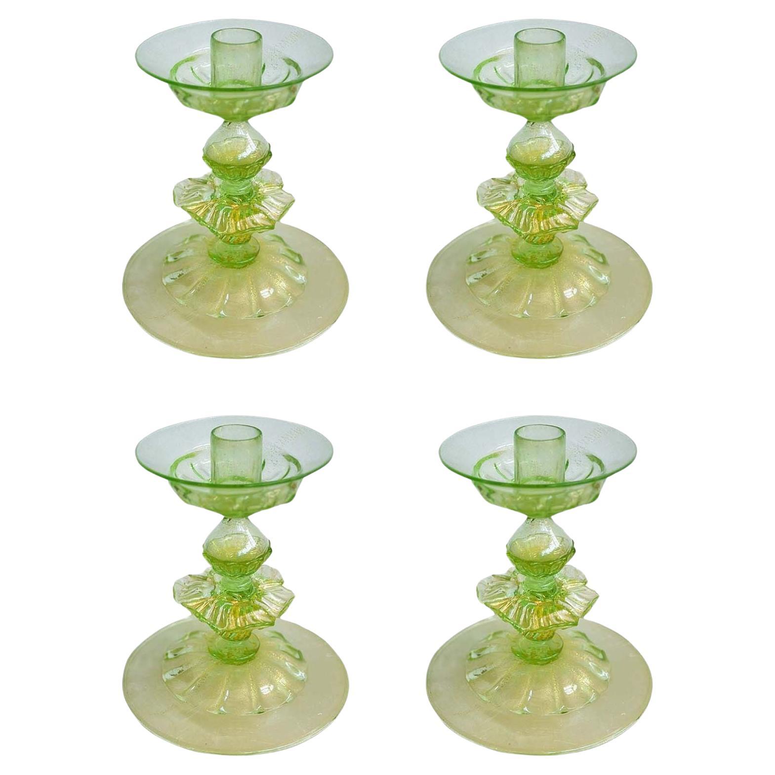 Set of Four Italian Green Murano Glass Candlesticks w/Gold Flecks For Sale
