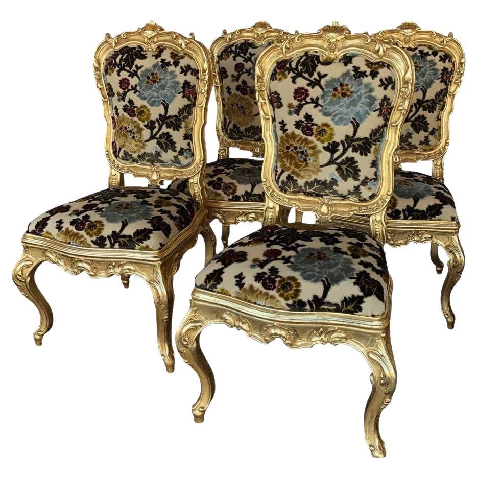 Set of Four Italian Hand-Carved Gilded Chairs with Vintage Floral Upholstery For Sale