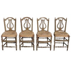 Set of Four Italian Lyre Back Painted and Gilt Side Chairs