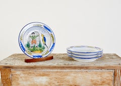 Set von vier italienischen Majolika-Tellern, handbemalt