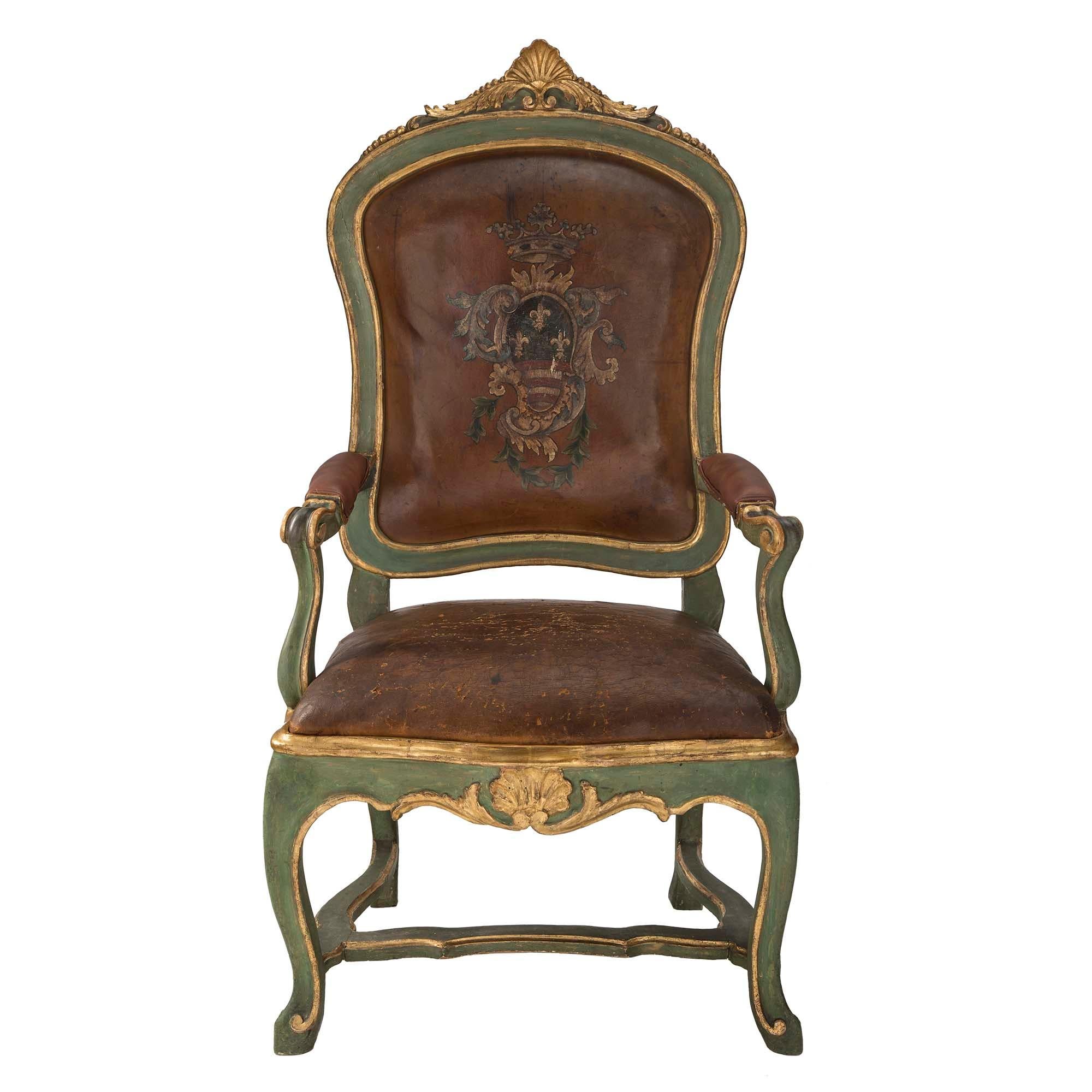 A very handsome and unique set of four Italian mid 18th century Roman armchairs. Each green colored polychrome armchair, À Chassis, which signifies that the upholstery is easily removed and changed for every season, is raised on scrolled legs,