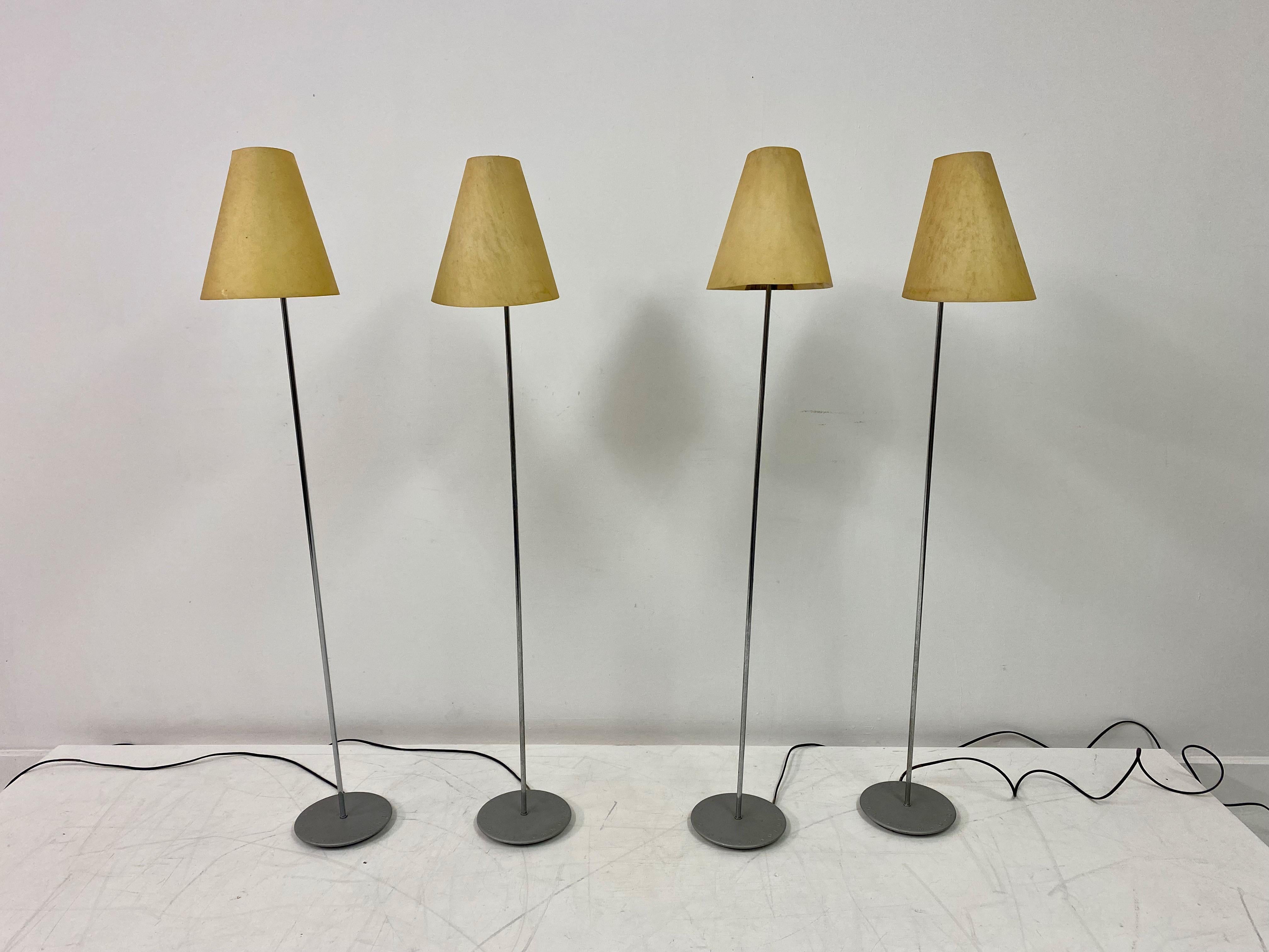 Set of four lamps

Chrome stem

Vellum shades

Mid size height

Toggle switch

Cast aluminium base with pressed letters

Probably Italian mid/late 20th century.