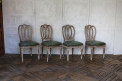 Set di quattro sedie da pranzo in stile neoclassico italiano con sedute in pelle verde
