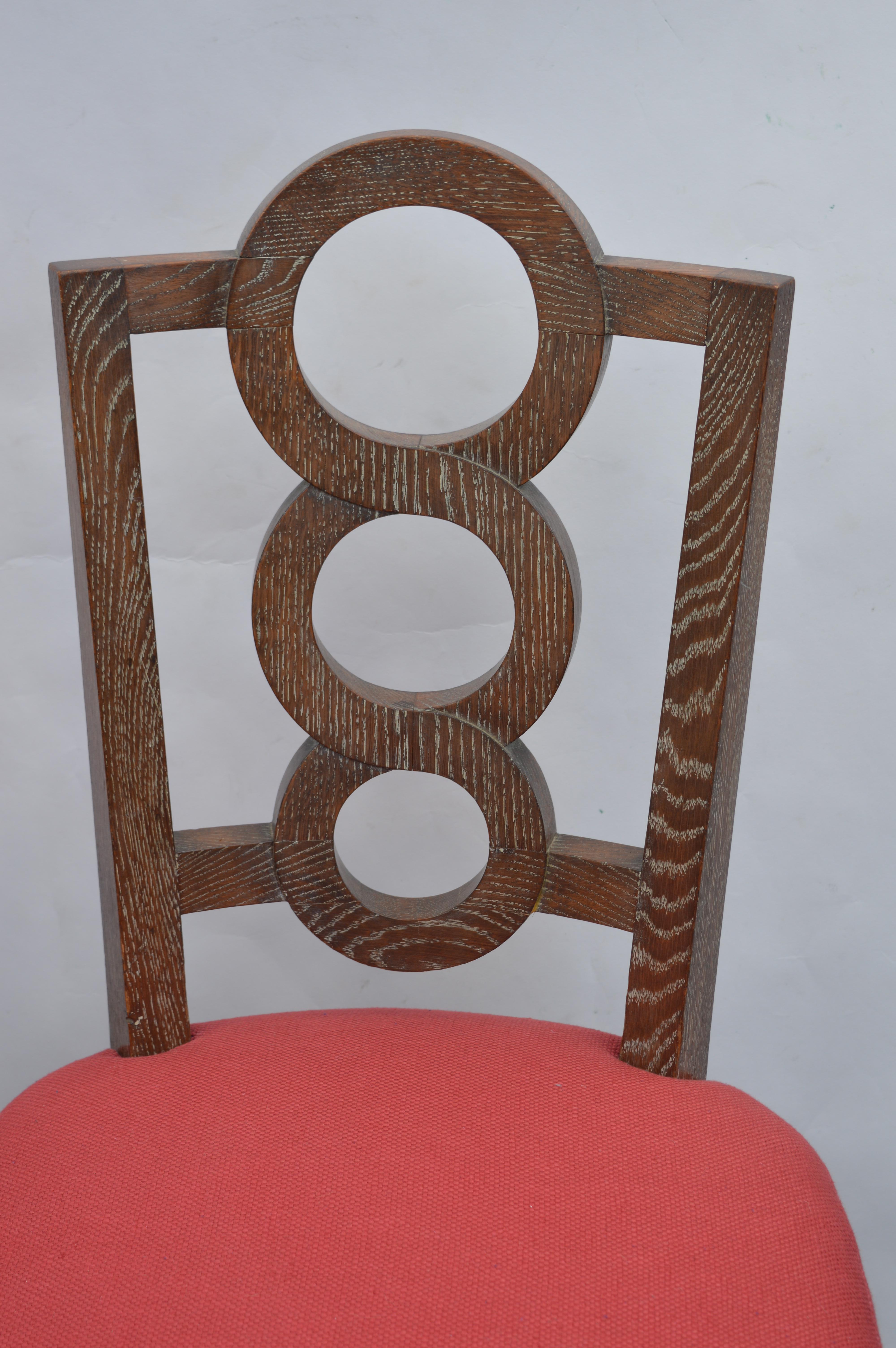 Four 1960s Italian oak chairs with a whitewashed finish and red seats.