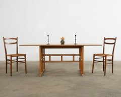 Satz von vier italienischen Esszimmerstühlen aus Nussbaumholz im Paolo Buffa-Stil