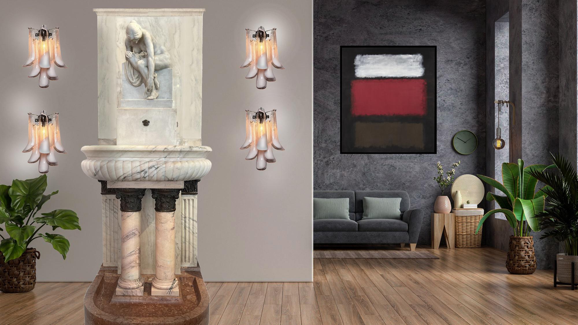 Set of four Vintage Italian Murano appliques. Wall lights have 6 pink and lattimo glass petals (for each applique) in a chrome frame.
Period: late XX century
Dimensions: 18,60 inches (48 cm) height; 12 inches (31 cm) width; 7,75 inches (20 cm) depth